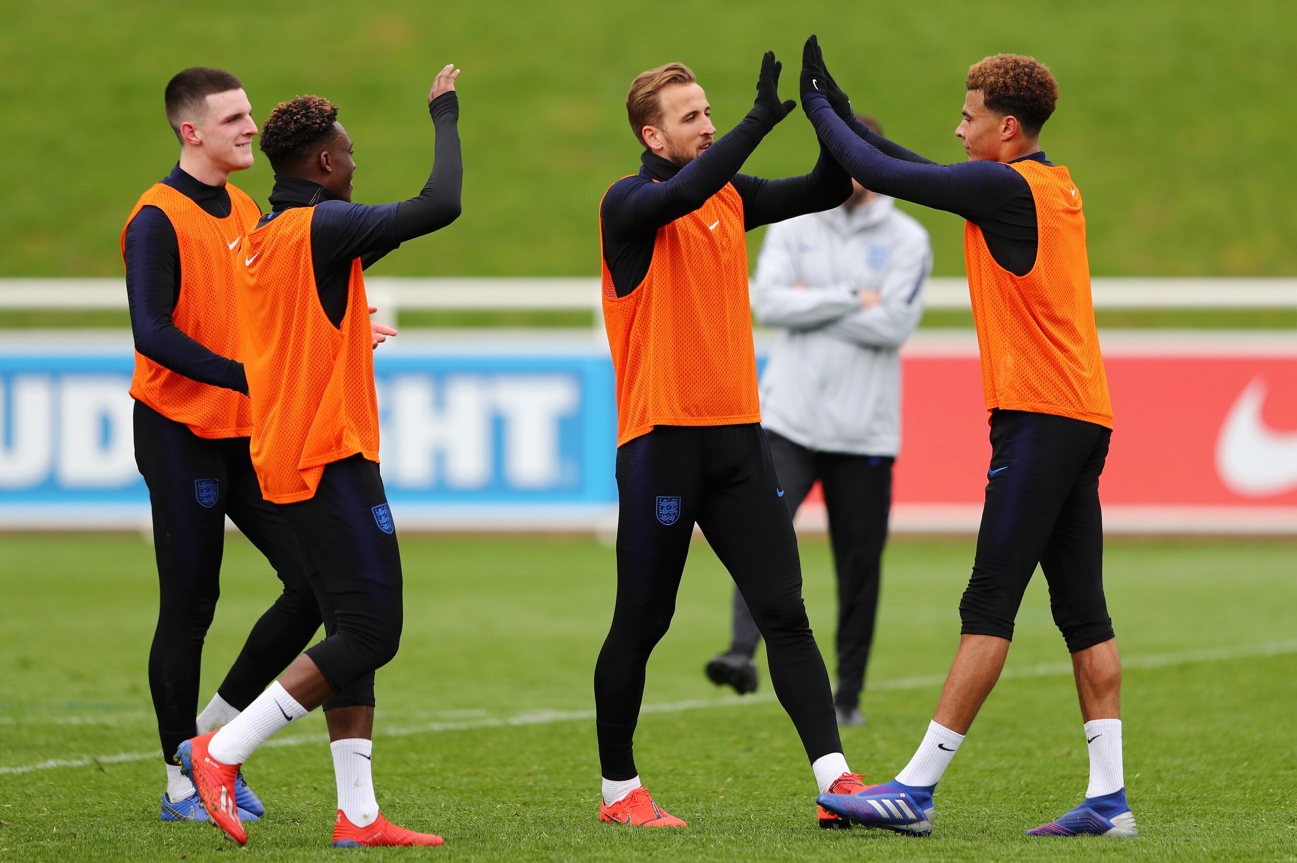BURTON-UPON-TRENT, ENGLAND - MARCH 19: Harry Kane of England celebrates with Dele Alli of England during an England training session during an England Media Access day at St Georges Park on March 19, 2019 in Burton-upon-Trent, England. (Photo by Matthew L