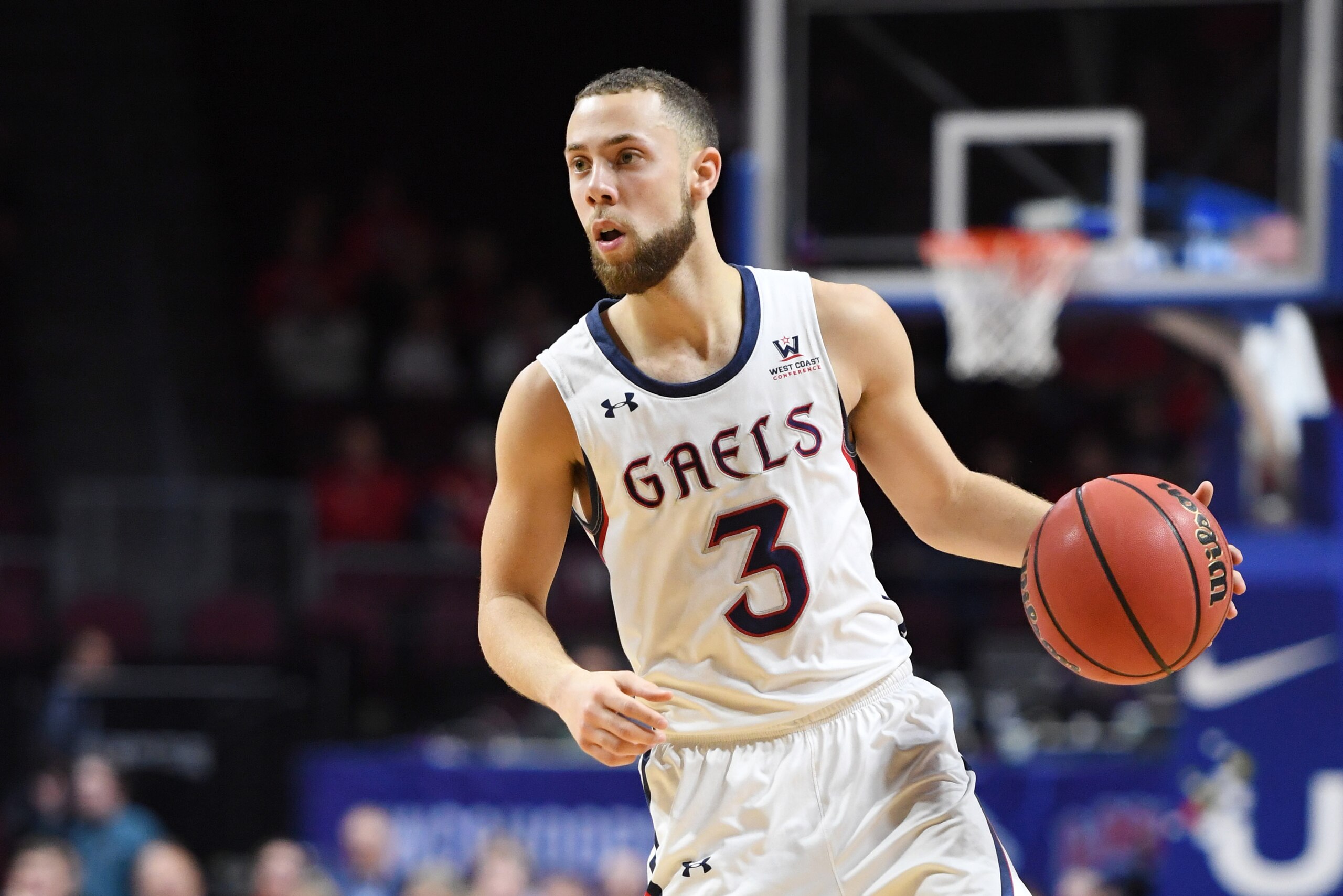 LAS VEGAS, NEVADA - MARCH 11:  Jordan Ford #3 of the Saint Mary's Gaels brings the ball up the court against the San Diego Toreros during a semifinal game of the West Coast Conference basketball tournament at the Orleans Arena on March 11, 2019 in Las Veg