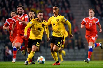 Belgium's forward Eden Hazard (L) and Belgium's midfielder Youri Tielemans (R) run after the ball during the Euro 2020 football qualification match between Belgium and Russia at the Roi Baudouin stadium, in Brussels on March 21, 2019. (Photo by DIRK WAEM 