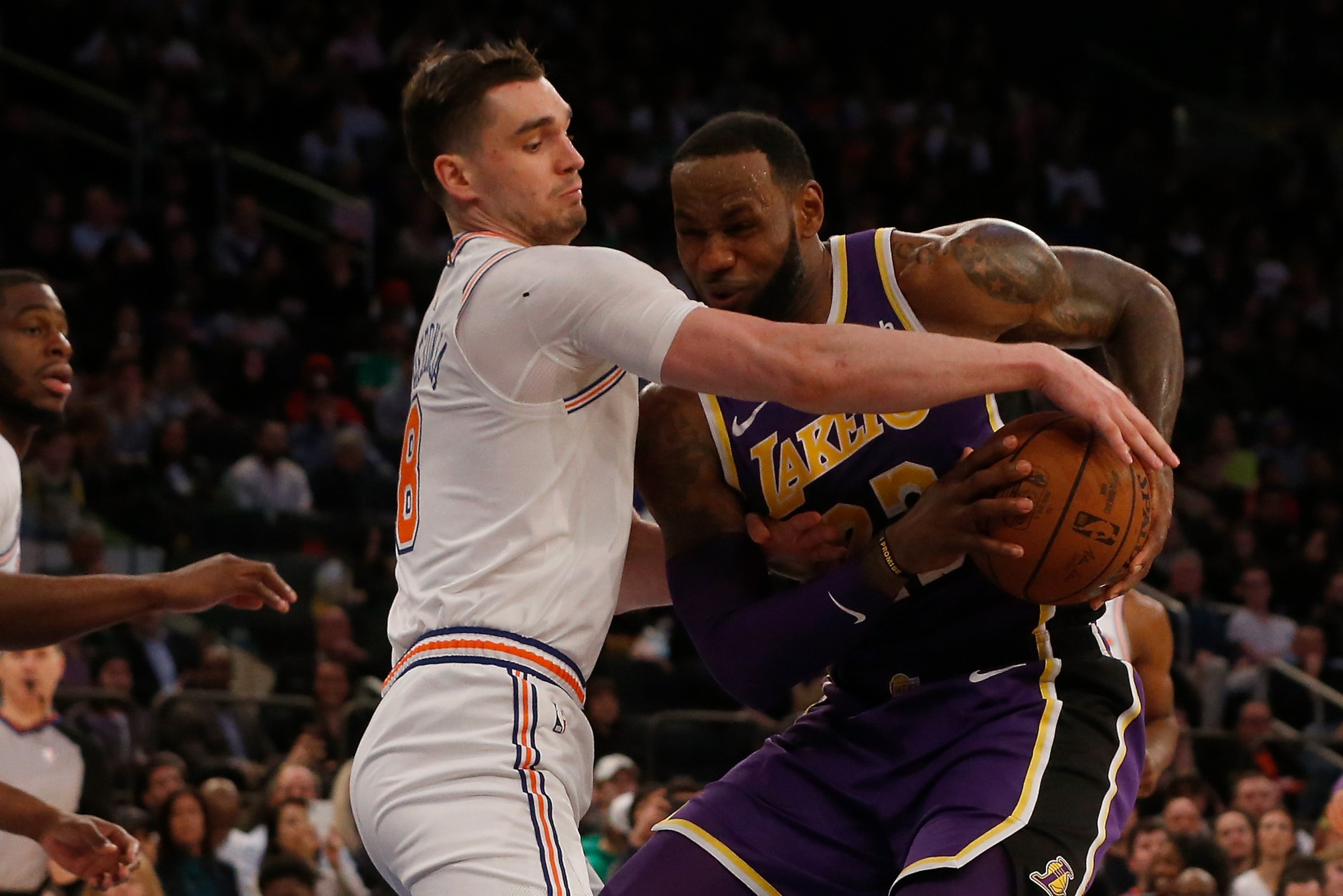 NEW YORK, NY - MARCH 17:  (NEW YORK DAILIES OUT)    LeBron James #23 of the Los Angeles Lakers in action against Mario Hezonja #8 of the New York Knicks at Madison Square Garden on March 17, 2019 in New York City. The Knicks defeated the Lakers 124-123. N