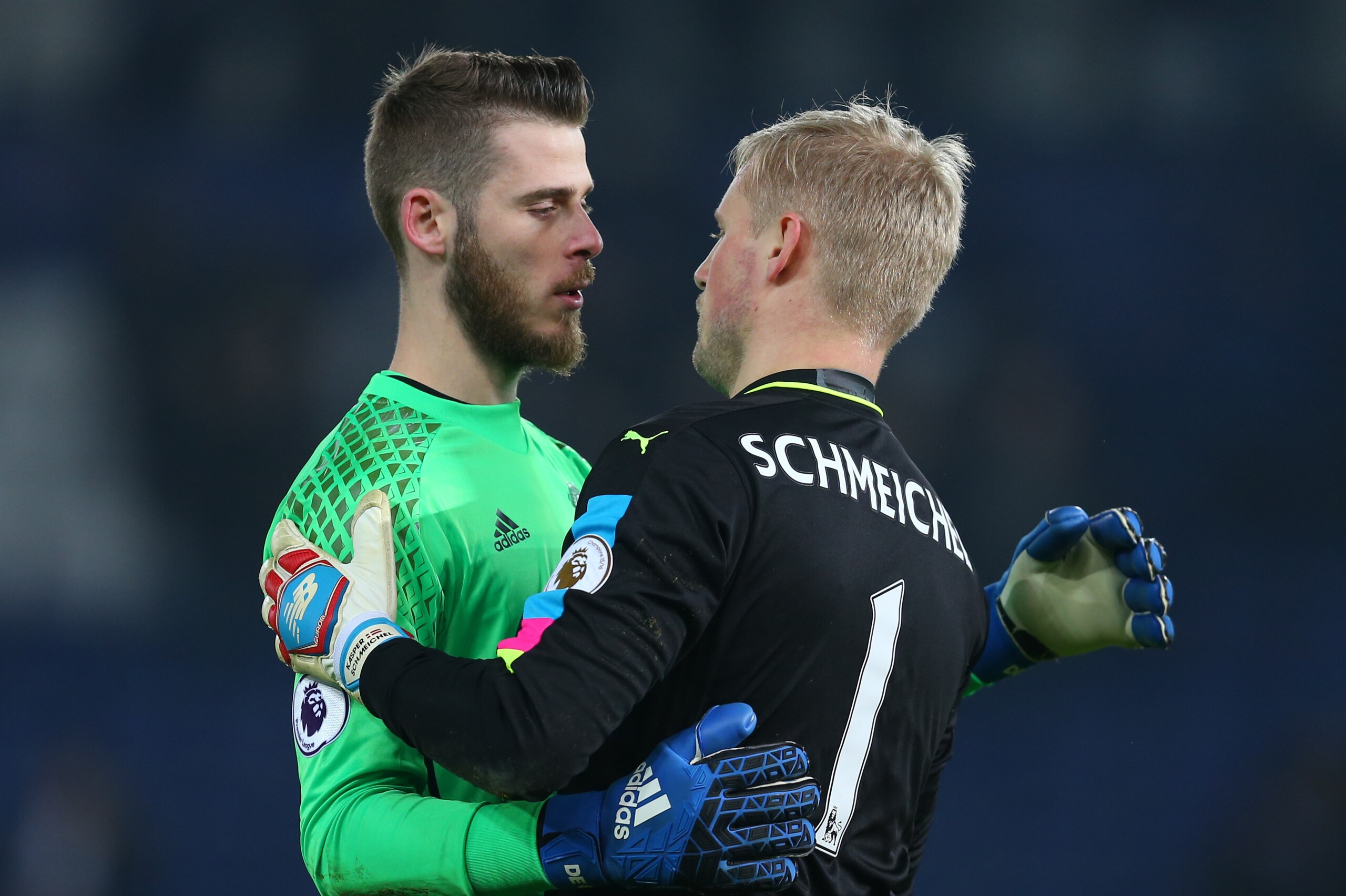 LEICESTER, ENGLAND - FEBRUARY 05: Manchester United goalkeeper David de Gea hugs Leicester City goalkeeper Kasper Schmeichel after the Premier League match between Leicester City and Manchester United at The King Power Stadium on February 5, 2017 in Leice