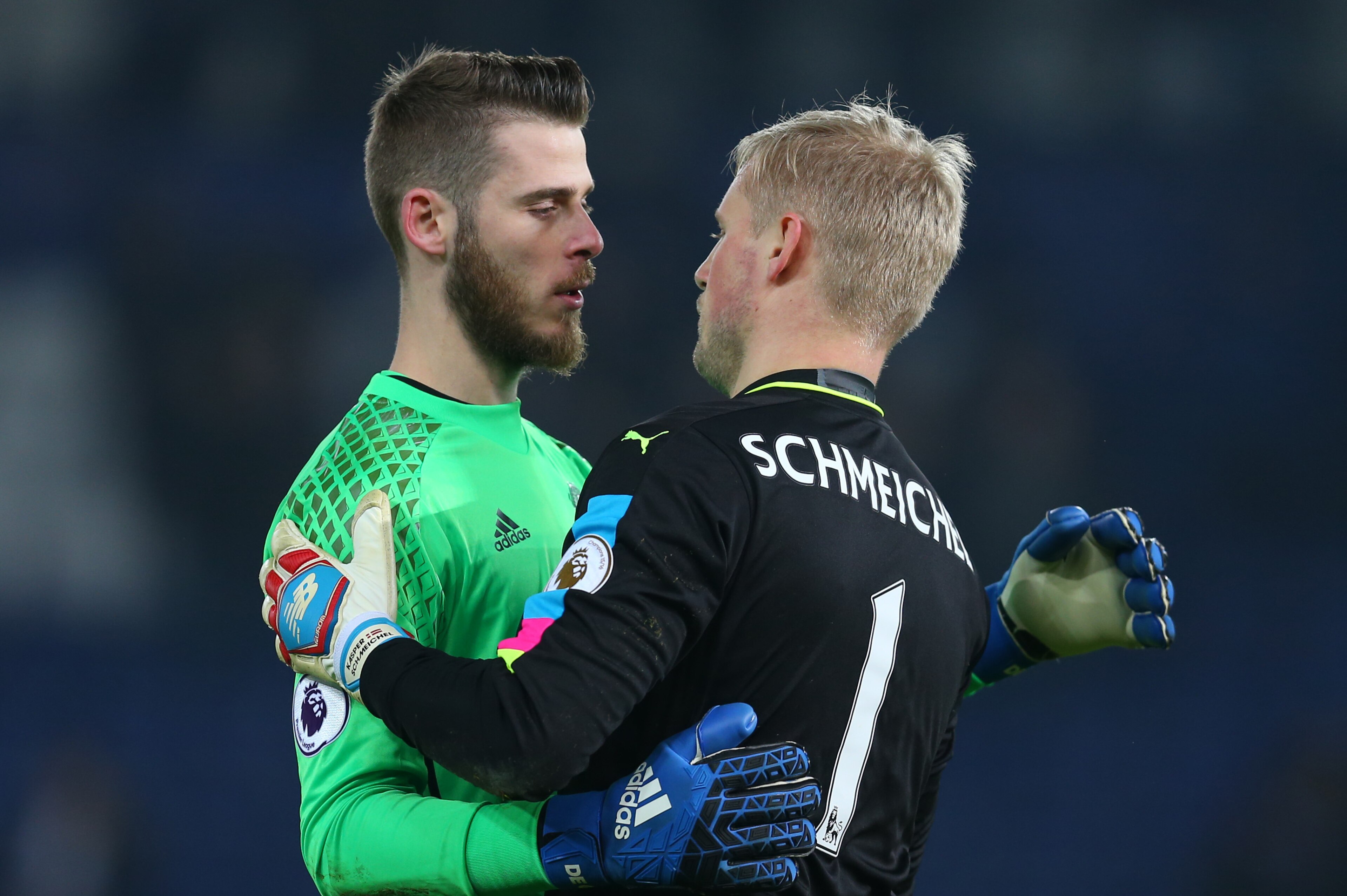 LEICESTER, ENGLAND - FEBRUARY 05: Manchester United goalkeeper David de Gea hugs Leicester City goalkeeper Kasper Schmeichel after the Premier League match between Leicester City and Manchester United at The King Power Stadium on February 5, 2017 in Leice