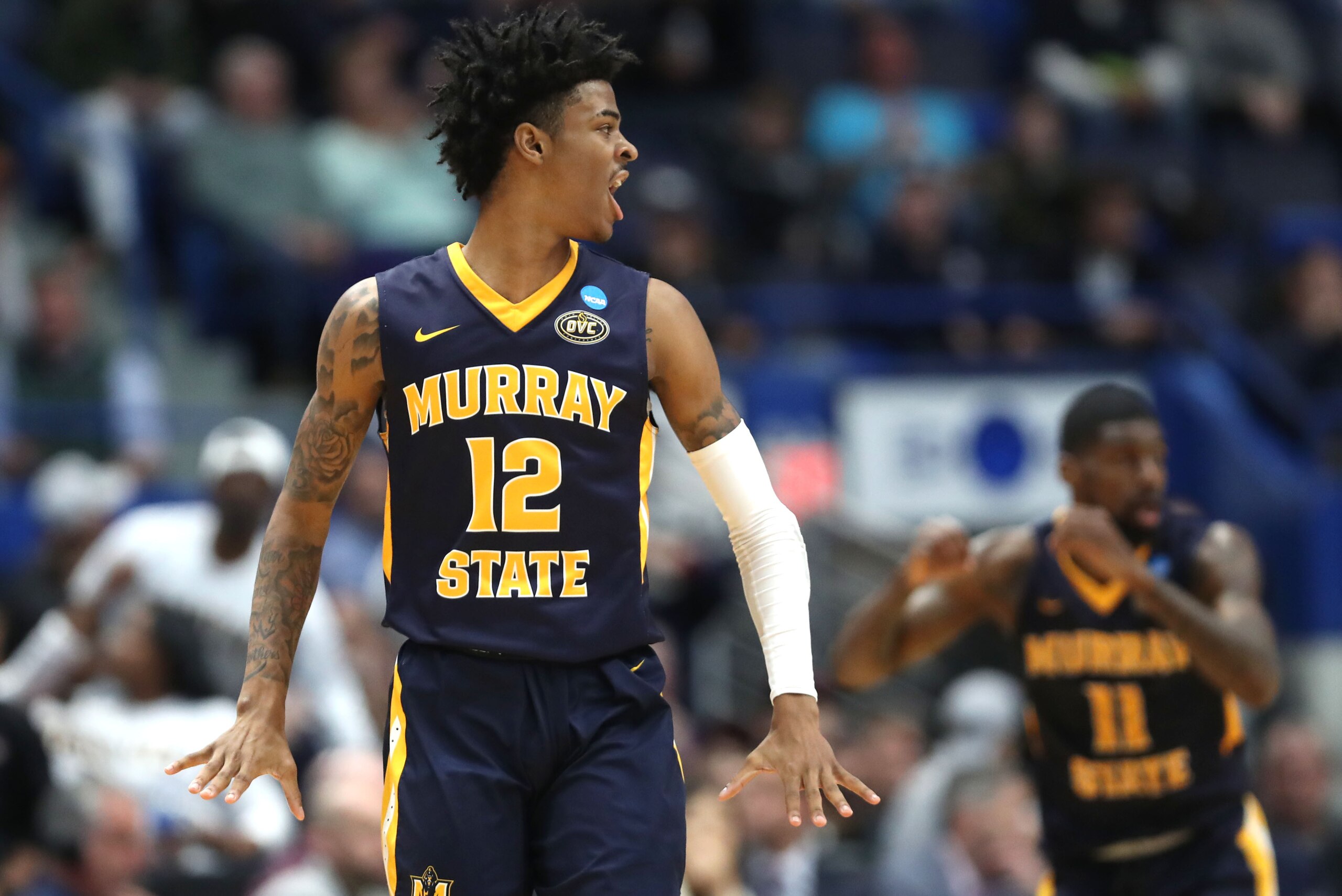 HARTFORD, CONNECTICUT - MARCH 21:  Ja Morant #12 of the Murray State Racers celebrates after making an assist during the second half of the first round game of the 2019 NCAA Men's Basketball Tournament against the Marquette Golden Eagles at XL Center on M