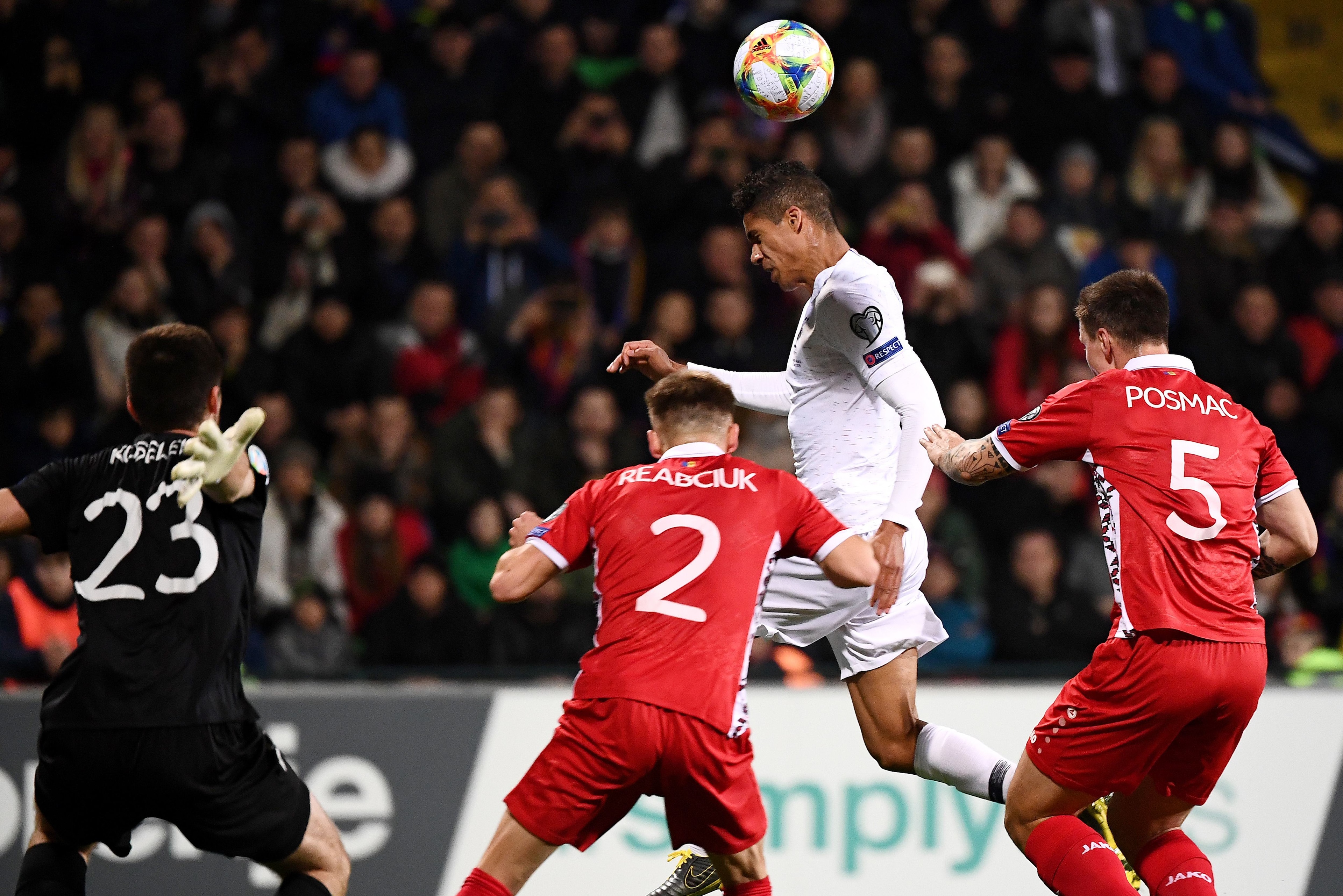 France's defender Raphael Varane (2ndR) scores a goal during the Euro 2020 qualifying football match between Moldova and France, on March 22, 2019 at Zimbru stadium in Chisinau. (Photo by FRANCK FIFE / AFP)        (Photo credit should read FRANCK FIFE/AFP