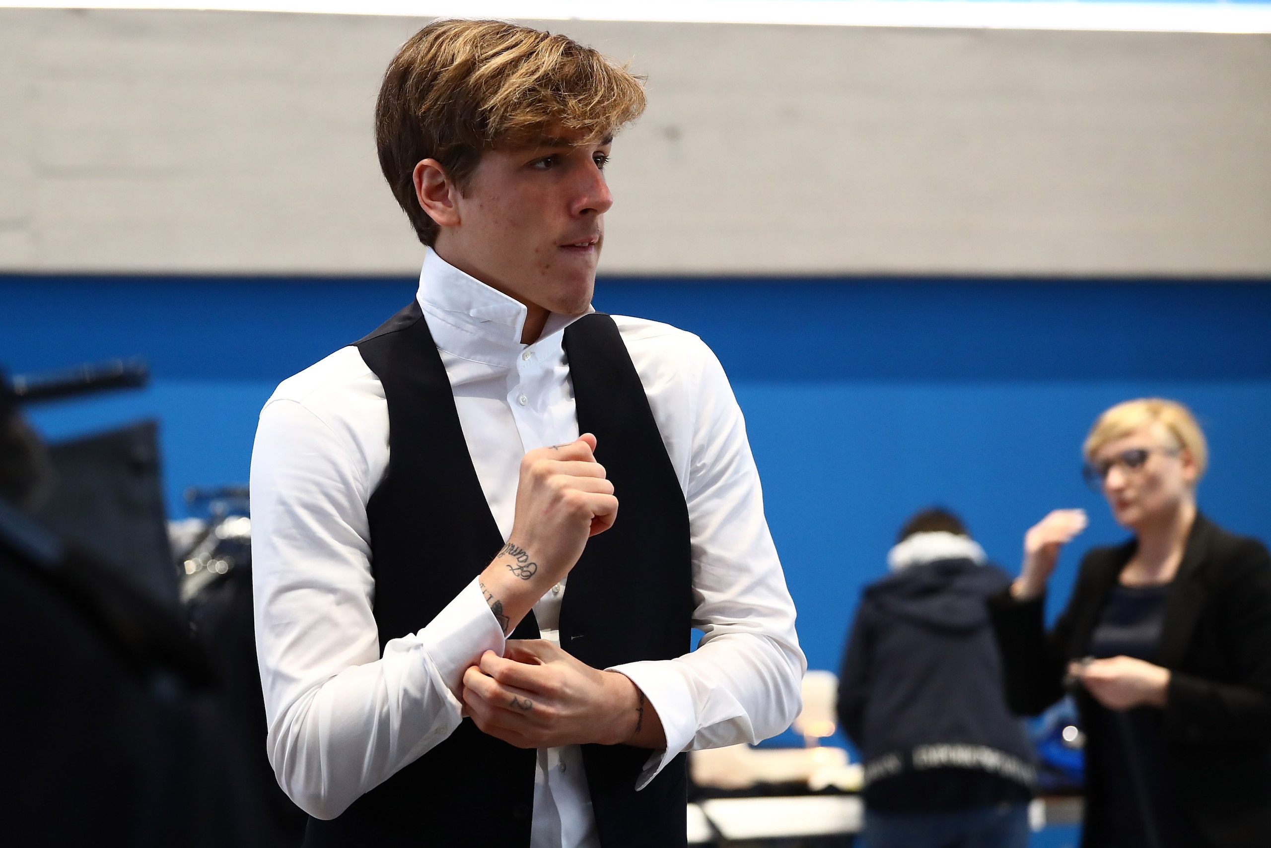 FLORENCE, ITALY - MARCH 19: Nicolo Zaniolo get dressed ahead of the Italy team photo with the new Armani suit at Centro Tecnico Federale di Coverciano on March 19, 2019 in Florence, Italy. (Photo by Marco Luzzani/Getty Images)