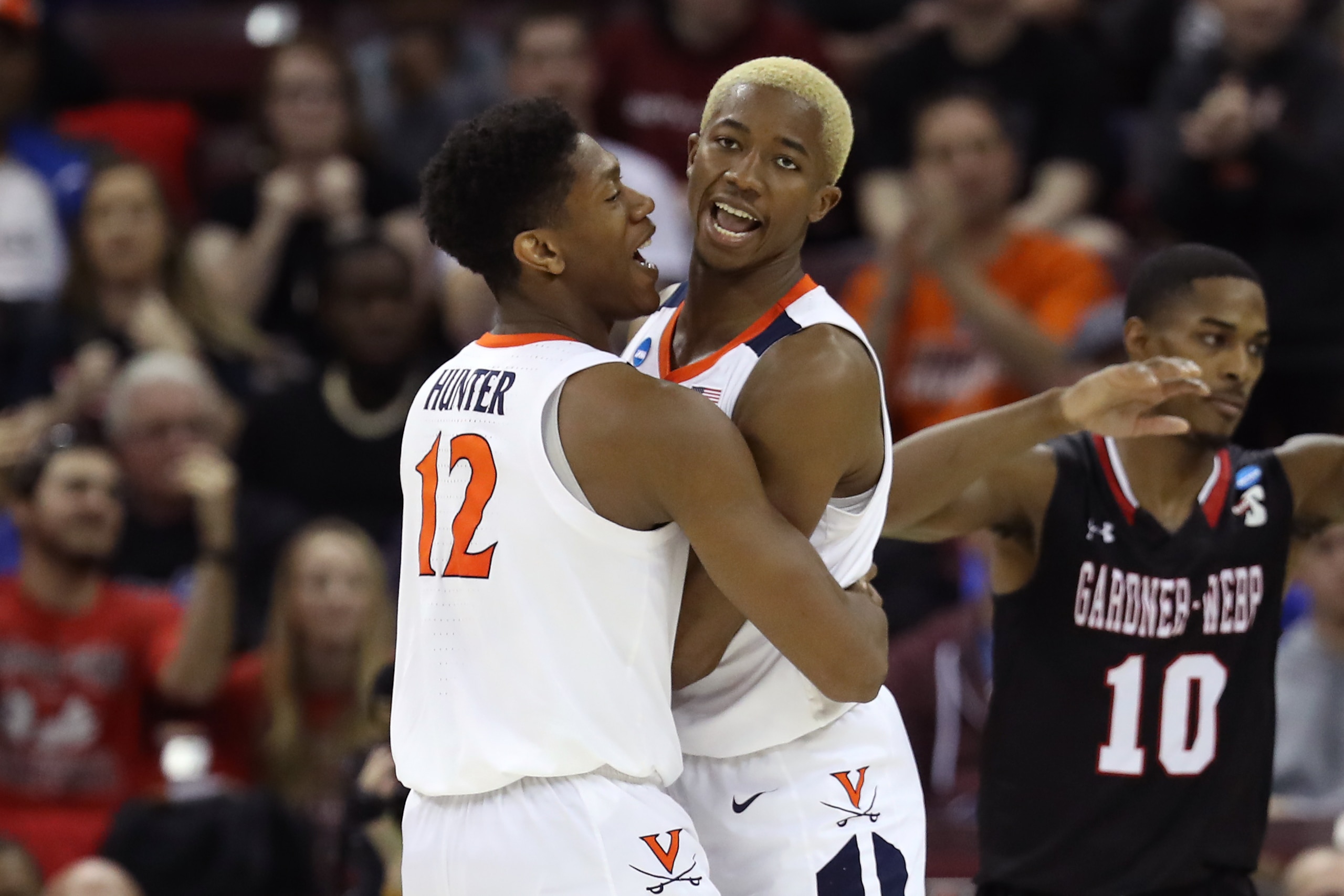 COLUMBIA, SOUTH CAROLINA - MARCH 22: De'Andre Hunter #12 and Mamadi Diakite #25 of the Virginia Cavaliers react in the second half against the Gardner Webb Runnin Bulldogs during the first round of the 2019 NCAA Men's Basketball Tournament at Colonial Lif