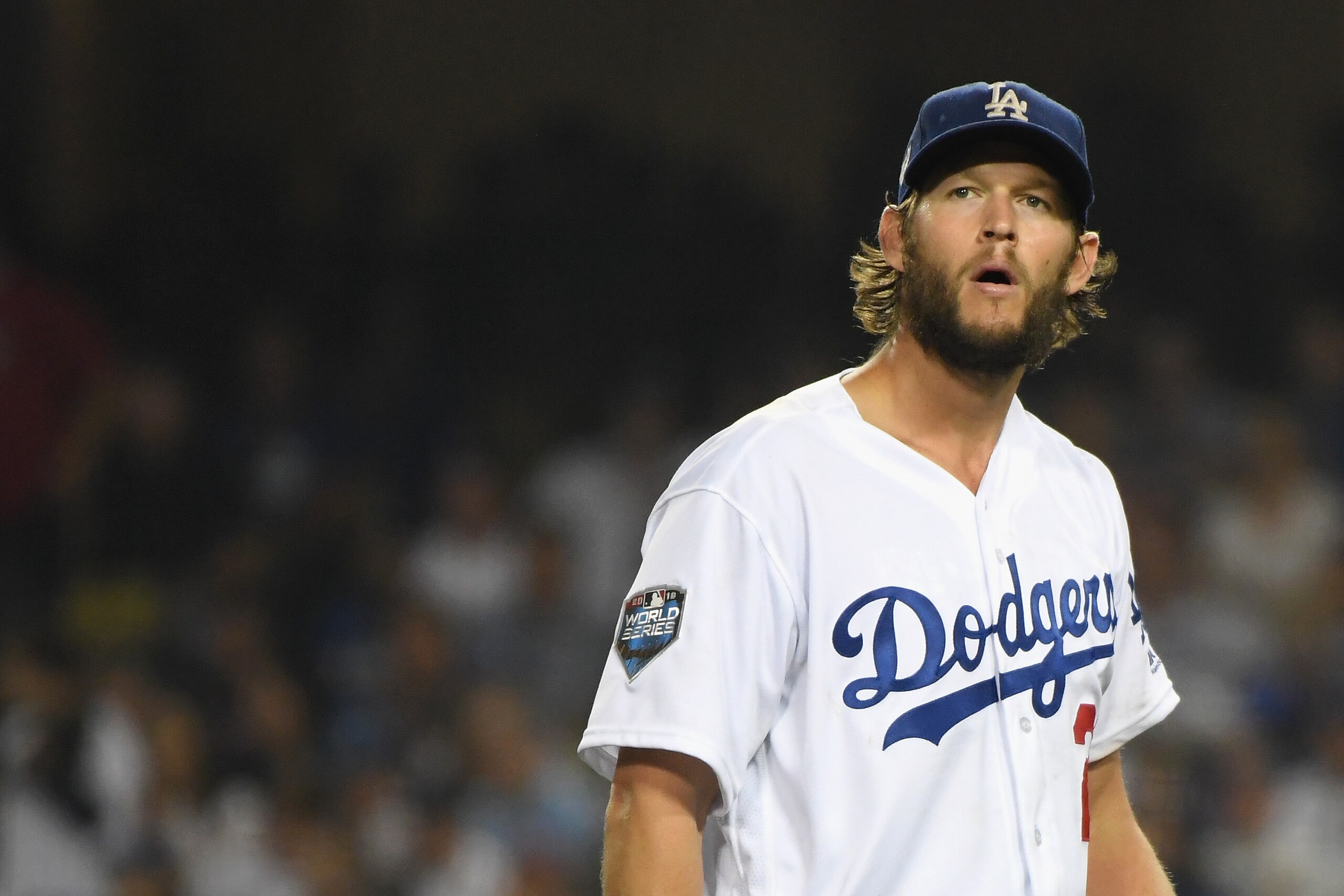 LOS ANGELES, CA - OCTOBER 28:  Clayton Kershaw #22 of the Los Angeles Dodgers reacts during the sixth inning against the Boston Red Sox in Game Five of the 2018 World Series at Dodger Stadium on October 28, 2018 in Los Angeles, California.  (Photo by Harr