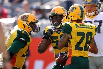 TEMPE, ARIZONA - MARCH 24:  Steven Johnson #59 of the Arizona Hotshots is congratulated by his teammates after an interception against the San Diego Fleet during the second half of the Alliance of American Football game at Sun Devil Stadium on March 24, 2