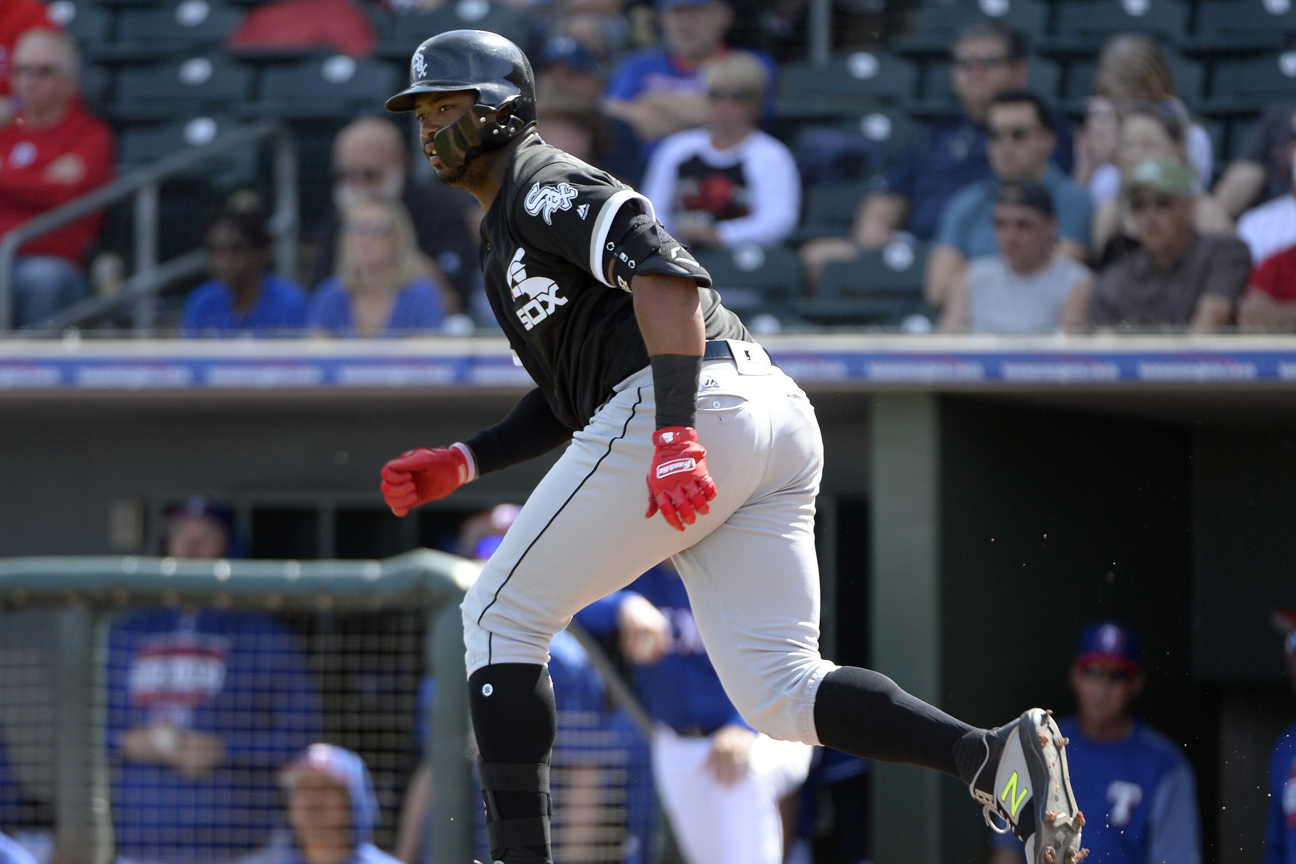 SURPRISE, ARIZONA - MARCH 01:  Eloy Jimenez #74 of the Chicago White Sox bats against the Texas Rangers on March 1, 2019 at Billy Parker Field at Surprise Stadium in Surprise Arizona.  (Photo by Ron Vesely/MLB Photos via Getty Images)