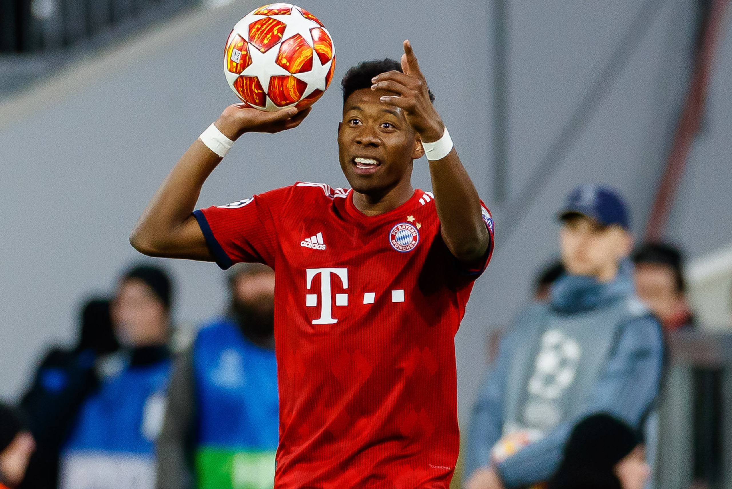 MUNICH, GERMANY - MARCH 13: David Alaba of Bayern Muenchen throw-in during the UEFA Champions League Round of 16 Second Leg match between FC Bayern Muenchen and Liverpool at Allianz Arena on March 13, 2019 in Munich, Germany. (Photo by TF-Images/Getty Ima