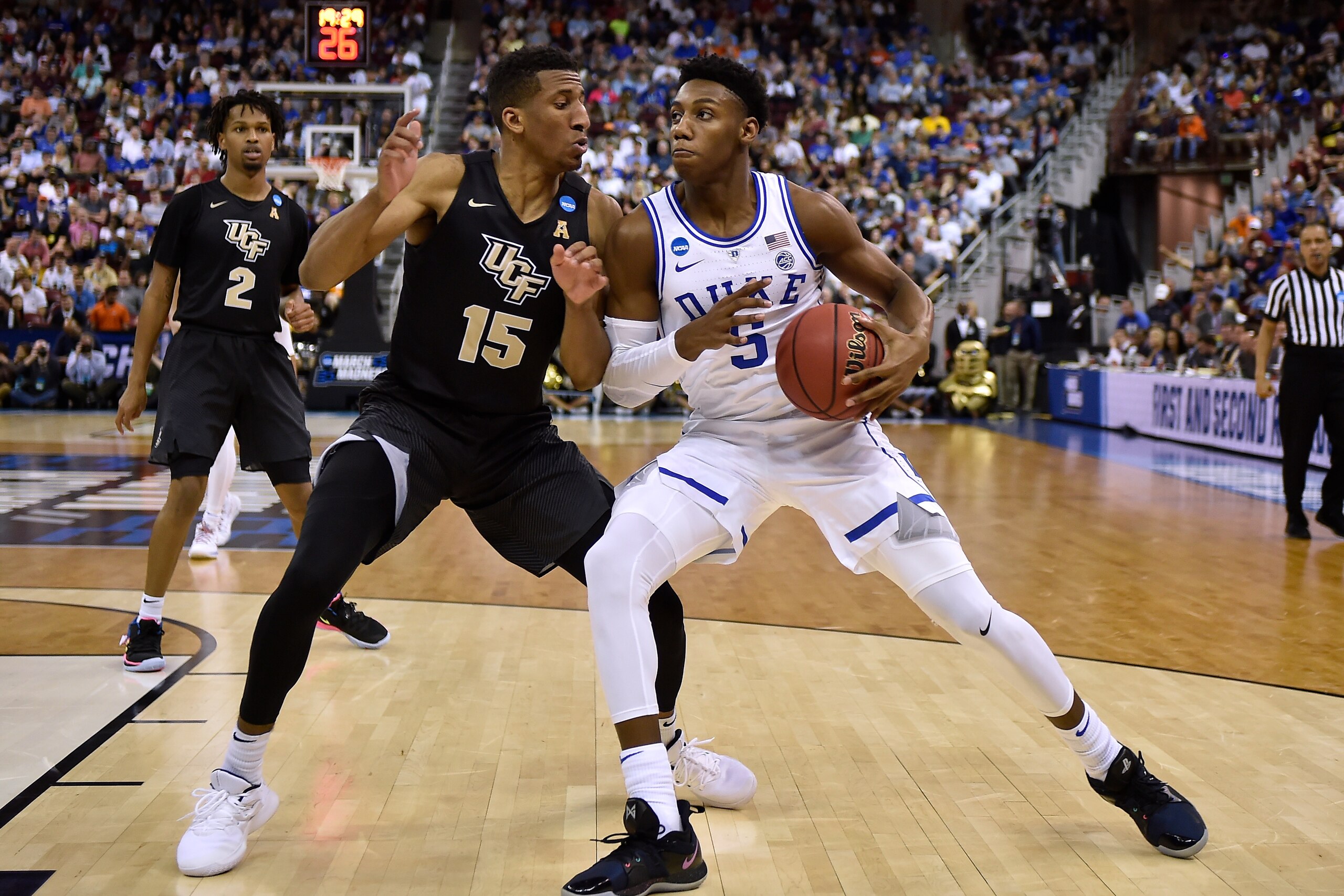 COLUMBIA, SC - MARCH 24: RJ Barrett #5 of the Duke Blue Devils moves the ball against Aubrey Dawkins #15 of the Central Florida Knights in the second half during the second round of the 2019 NCAA Men's Basketball Tournament at Colonial Life Arena on March
