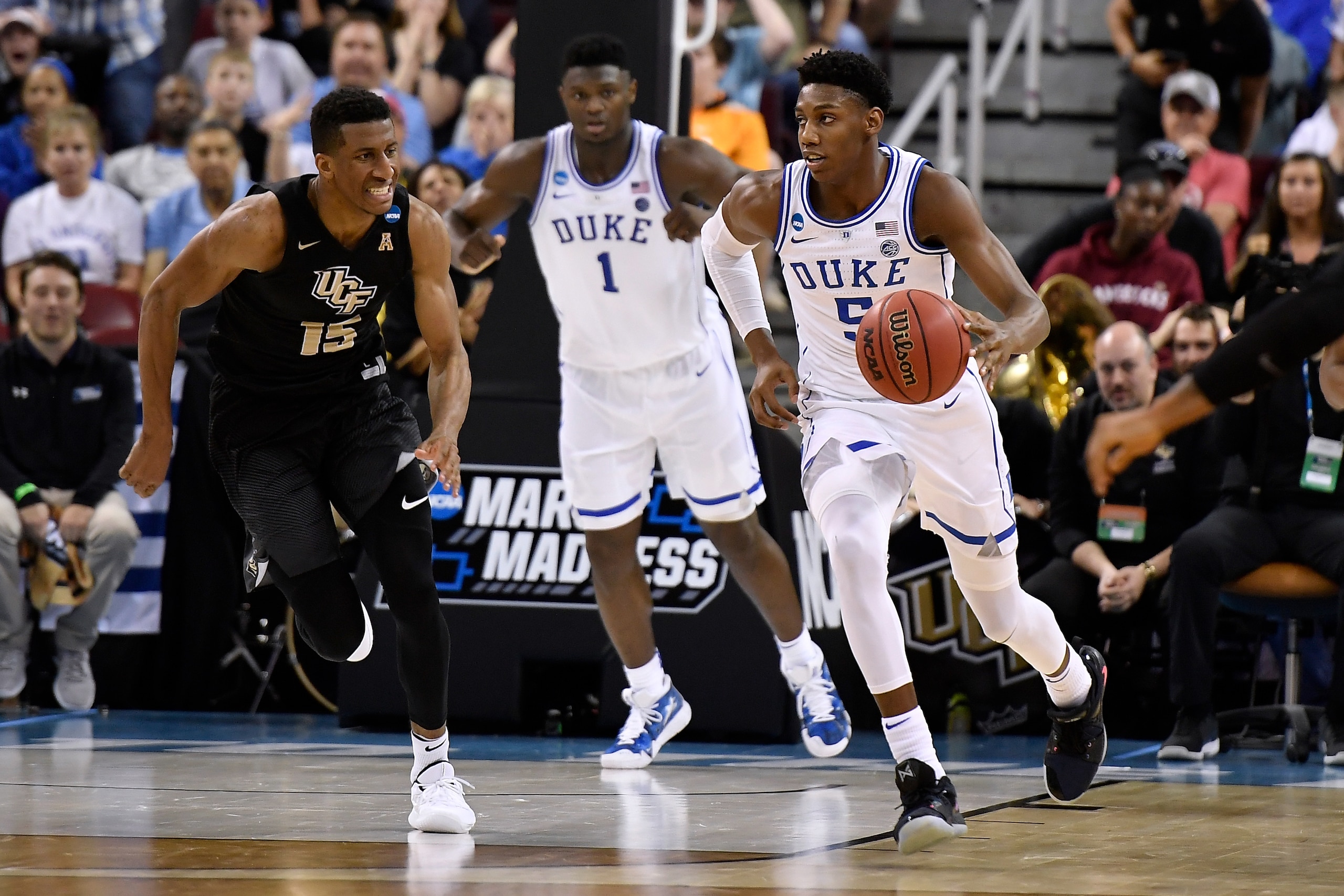COLUMBIA, SC - MARCH 24: RJ Barrett #5 of the Duke Blue Devils moves the ball against Aubrey Dawkins #15 of the Central Florida Knights late in their game during the second round of the 2019 NCAA Men's Basketball Tournament at Colonial Life Arena on March