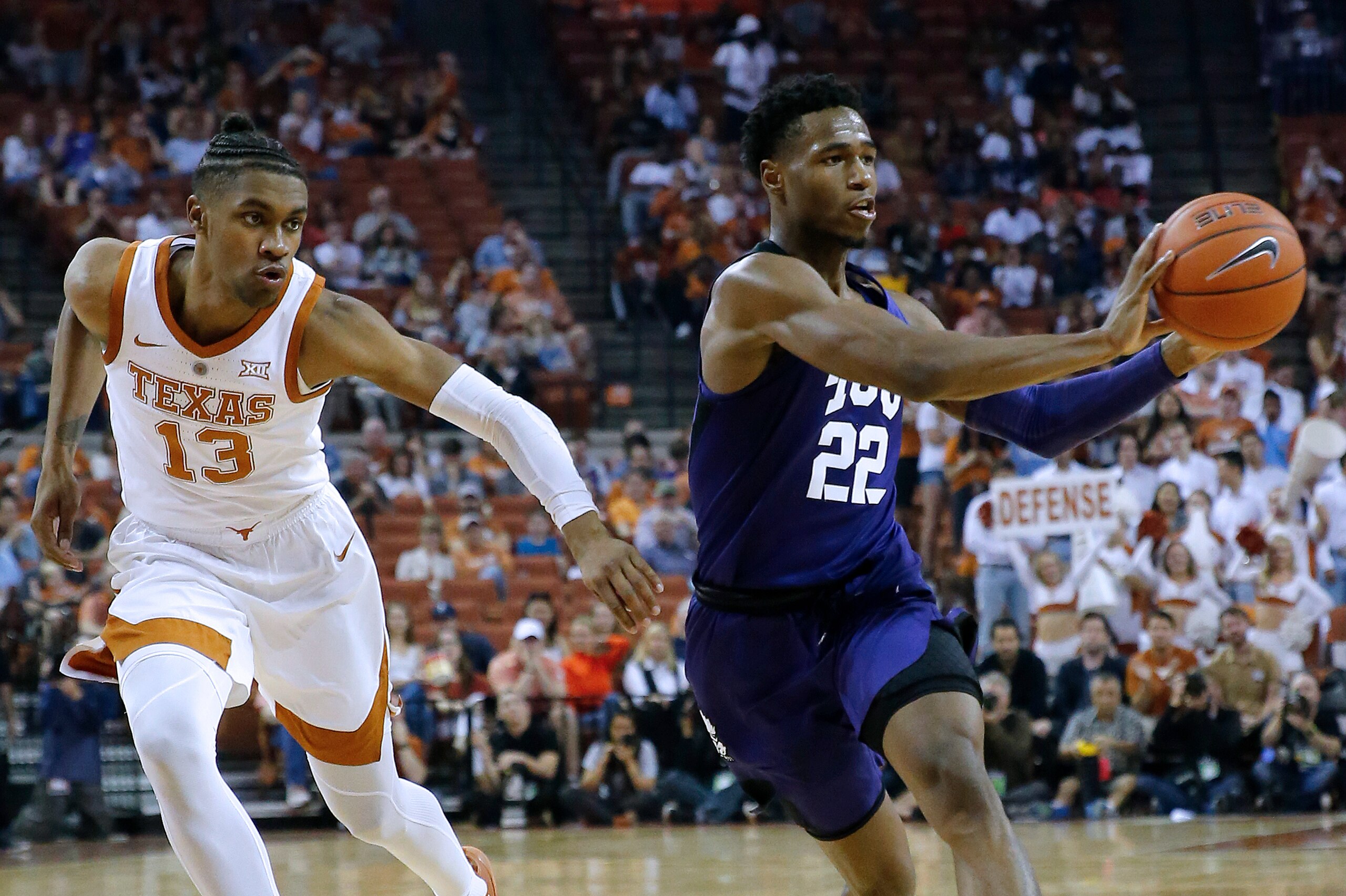 AUSTIN, TEXAS - MARCH 09: RJ Nembhard #22 of the TCU Horned Frogs passes the ball in front of Jase Febres #13 of the Texas Longhorns at The Frank Erwin Center on March 09, 2019 in Austin, Texas. (Photo by Chris Covatta/Getty Images)