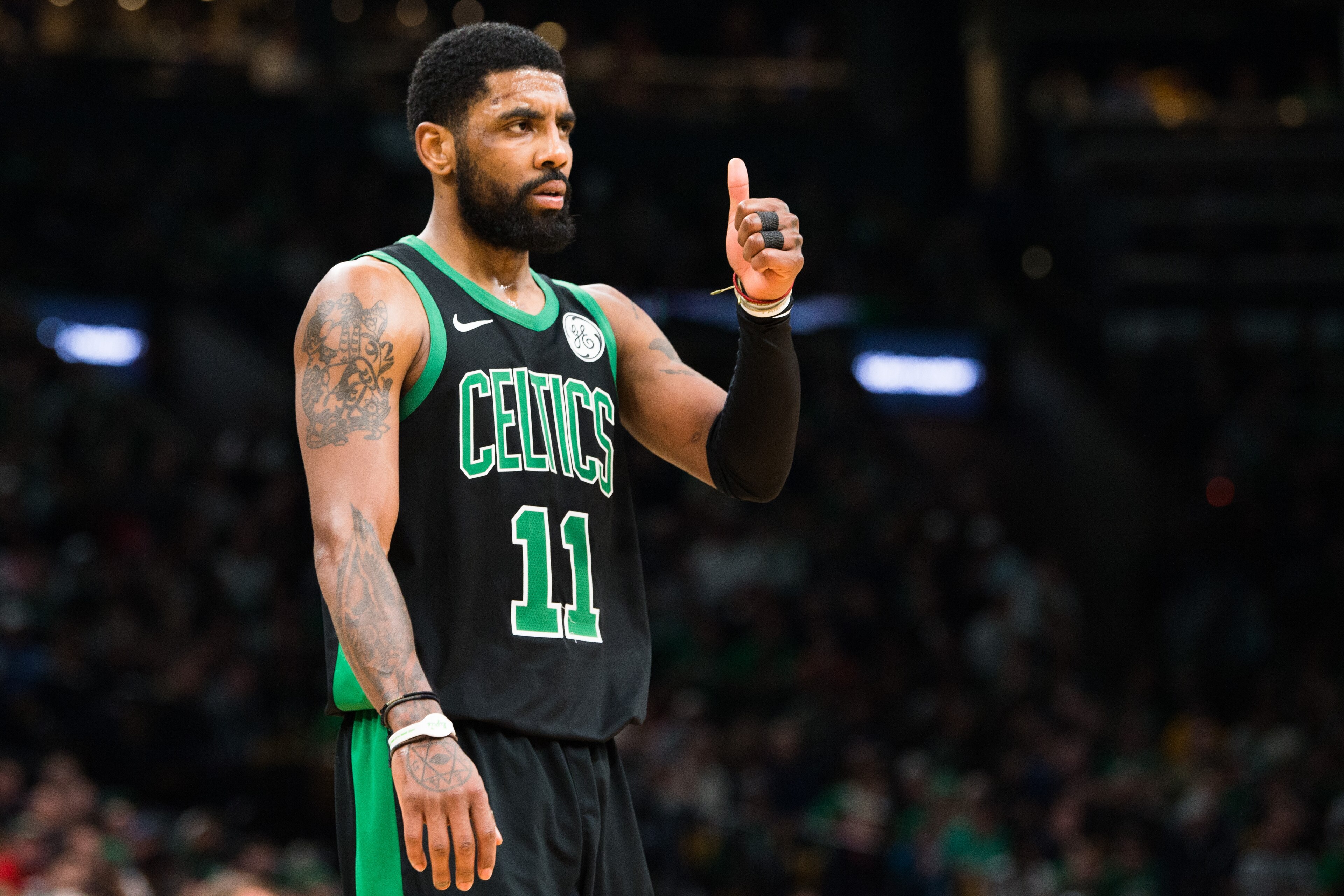 BOSTON, MA - MARCH 24: Kyrie Irving #11 of the Boston Celtics gives a thumbs up during a game against the San Antonio Spurs at TD Garden on March 24, 2019 in Boston, Massachusetts. NOTE TO USER: User expressly acknowledges and agrees that, by downloading BOSTON, MA - MARCH 24: Kyrie Irving #11 of the Boston Celtics gives a thumbs up during a game against the San Antonio Spurs at TD Garden on March 24, 2019 in Boston, Massachusetts. NOTE TO USER: User expressly acknowledges and agrees that, by downloading