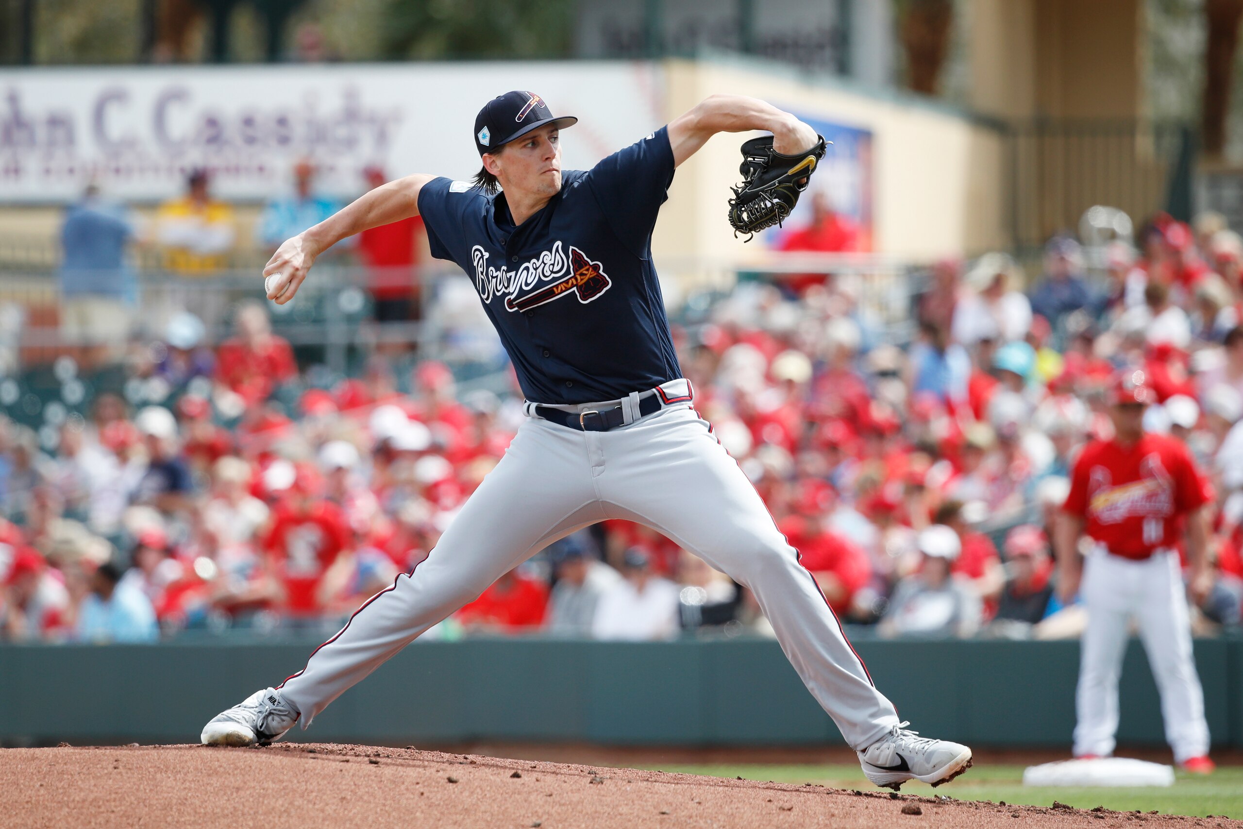 JUPITER, FL - FEBRUARY 27: Kyle Wright #65 of the Atlanta Braves pitches during a Grapefruit League spring training game against the St. Louis Cardinals at Roger Dean Stadium on February 27, 2019 in Jupiter, Florida. The Braves won 4-0. (Photo by Joe Robb