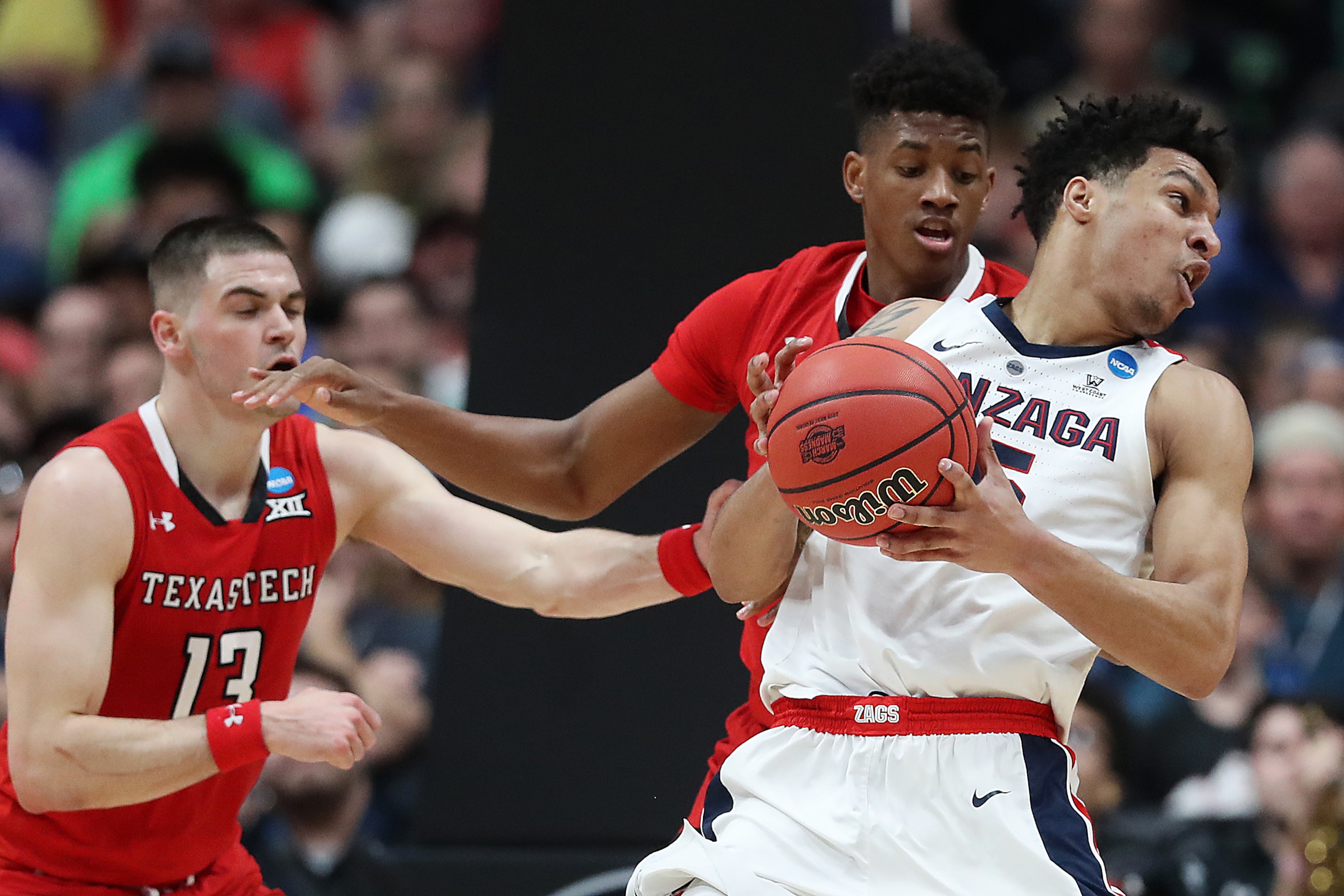 ANAHEIM, CALIFORNIA - MARCH 30: Brandon Clarke #15 of the Gonzaga Bulldogs posts up against Jarrett Culver #23 of the Texas Tech Red Raiders during the first half of the 2019 NCAA Men's Basketball Tournament West Regional at Honda Center on March 30, 2019