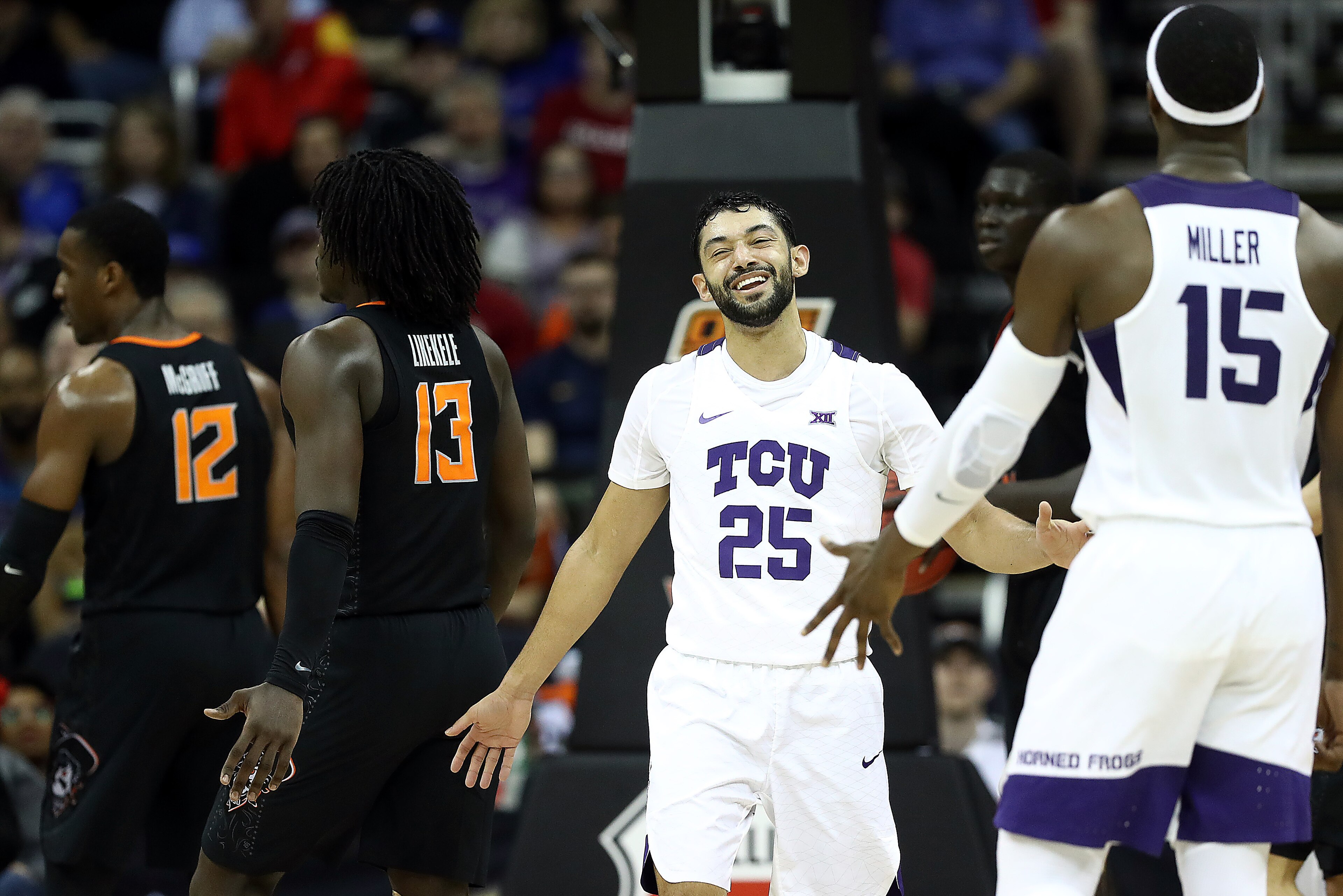 KANSAS CITY, MISSOURI - MARCH 13:  Alex Robinson #25 of the TCU Horned Frogs smiles after drawing a foul during the first round game of the Big 12 Basketball Tournament against the Oklahoma State Cowboys at the Sprint Center on March 13, 2019 in Kansas Ci