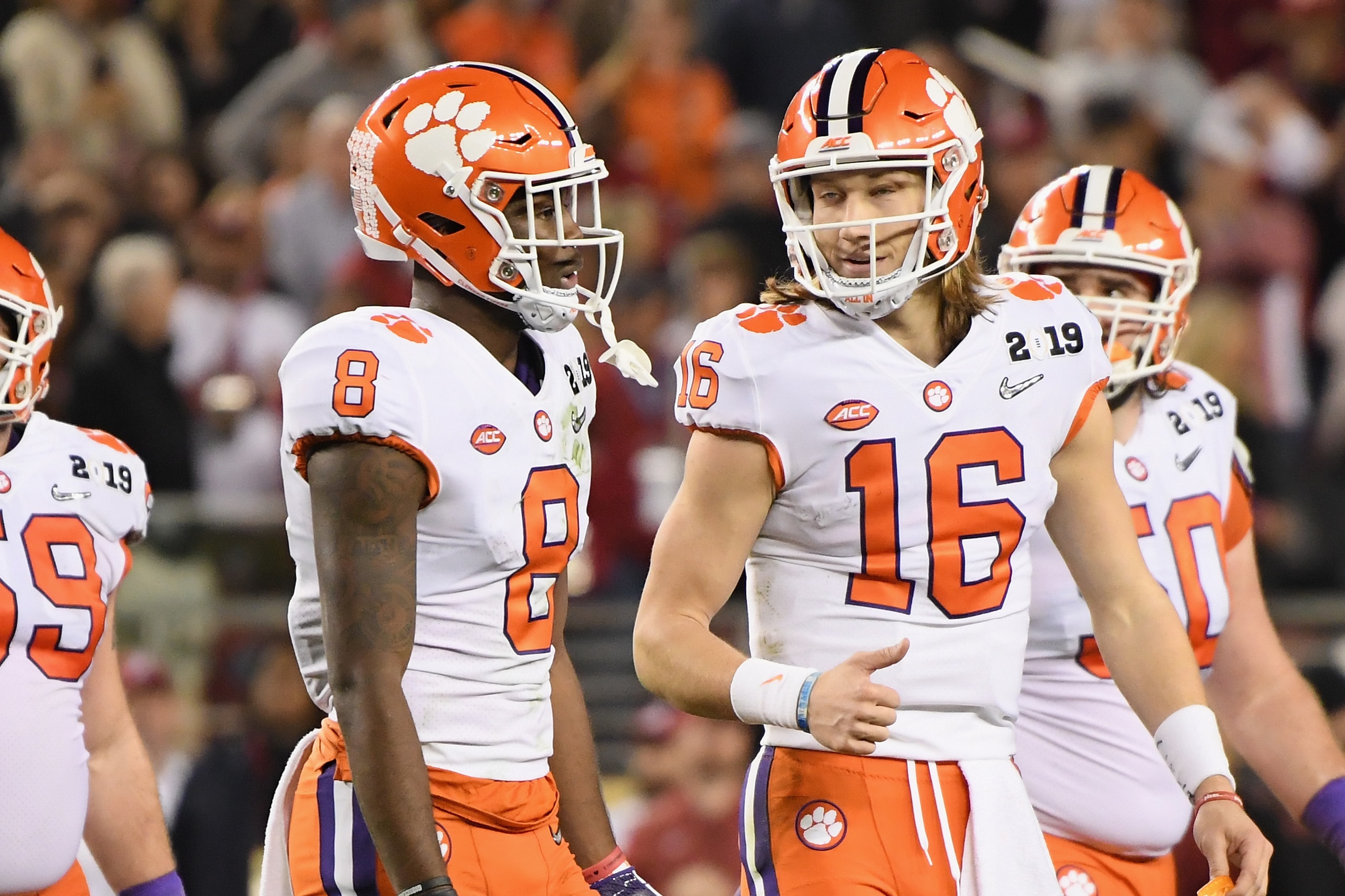 SANTA CLARA, CA - JANUARY 07:  Justyn Ross #8 and Trevor Lawrence #16 of the Clemson Tigers react against the Alabama Crimson Tide in the CFP National Championship presented by AT&T at Levi's Stadium on January 7, 2019 in Santa Clara, California.  (Photo 