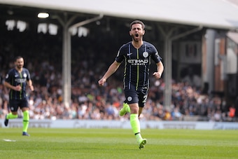 LONDON, ENGLAND - MARCH 30: Bernardo Silva of Manchester City celebrates after scoring his team's first goal during the Premier League match between Fulham FC and Manchester City at Craven Cottage on March 30, 2019 in London, United Kingdom.(Photo by Rich