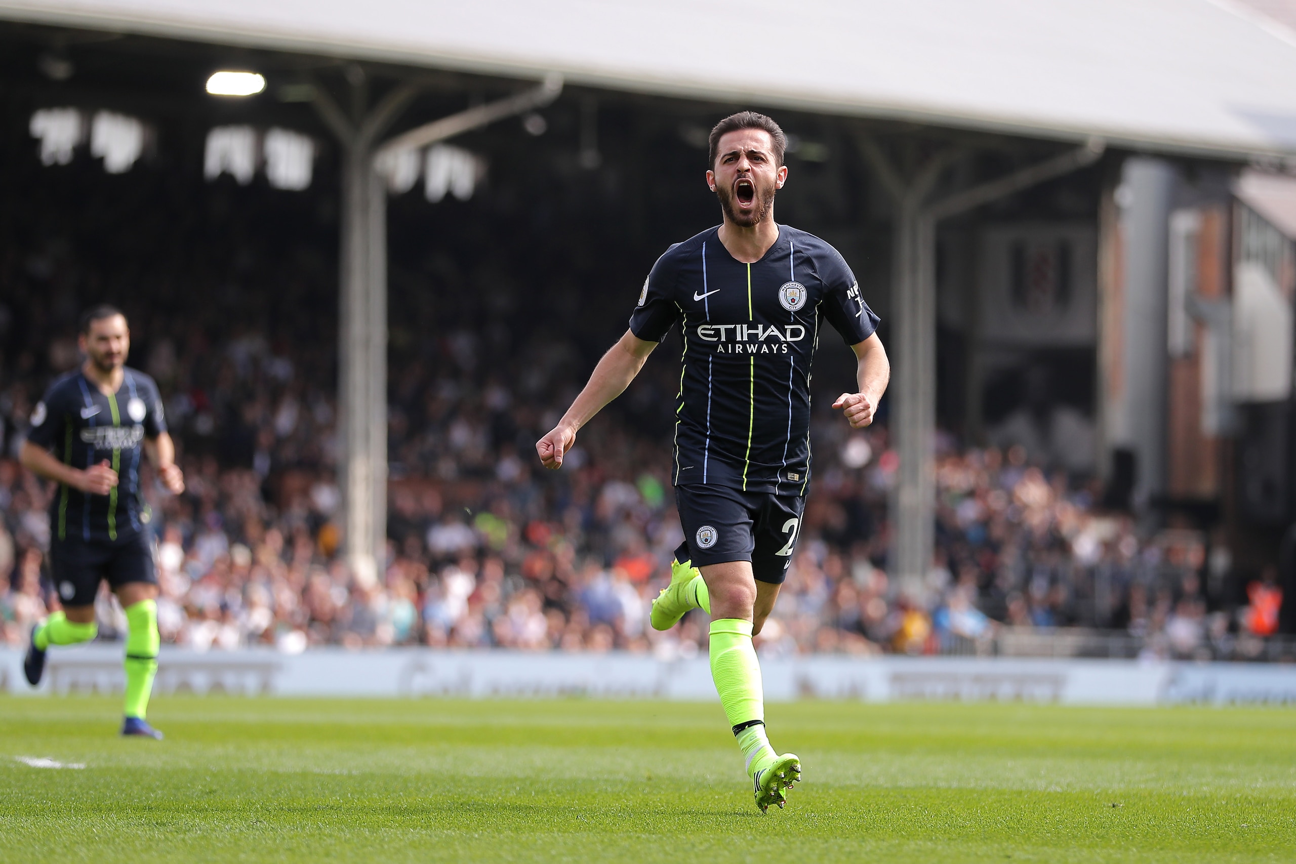 LONDON, ENGLAND - MARCH 30: Bernardo Silva of Manchester City celebrates after scoring his team's first goal during the Premier League match between Fulham FC and Manchester City at Craven Cottage on March 30, 2019 in London, United Kingdom.(Photo by Rich LONDON, ENGLAND - MARCH 30: Bernardo Silva of Manchester City celebrates after scoring his team's first goal during the Premier League match between Fulham FC and Manchester City at Craven Cottage on March 30, 2019 in London, United Kingdom.(Photo by Rich
