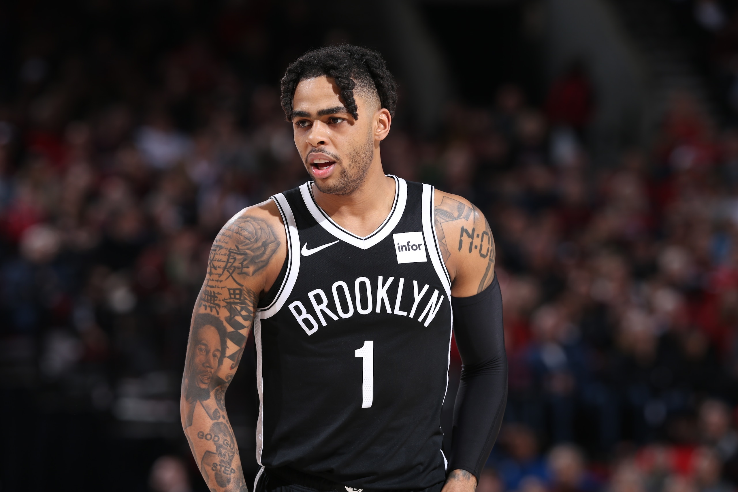 PORTLAND, OR - MARCH 25: D'Angelo Russell #1 of the Brooklyn Nets looks on against the Portland Trail Blazers  on March 25, 2019 at the Moda Center Arena in Portland, Oregon. NOTE TO USER: User expressly acknowledges and agrees that, by downloading and or