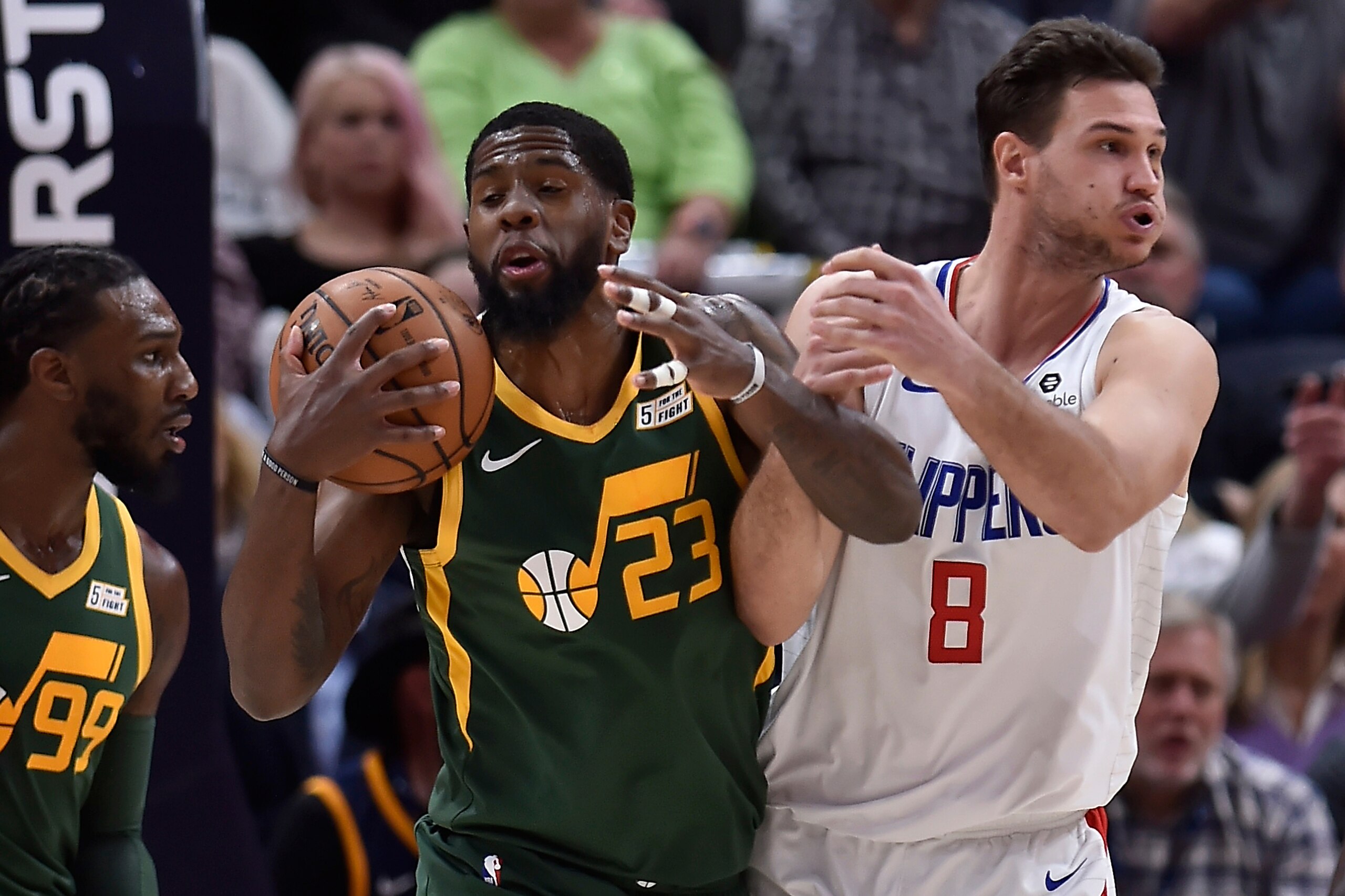 SALT LAKE CITY, UT - FEBRUARY 27: Royce O'Neale #23 of the Utah Jazz and Danilo Gallinari #8 of the LA Clippers fight for the ball in the second half of a NBA game at Vivint Smart Home Arena on February 27, 2019 in Salt Lake City, Utah. NOTE TO USER: User