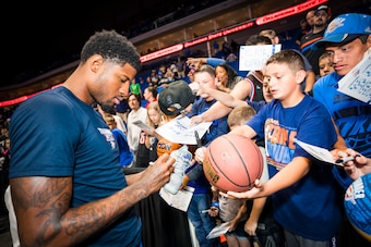 TULSA, OK - OCTOBER 7:  Paul George #13 of the Oklahoma City Thunder signs autographs for fans prior to a pre-season against the Atlanta Hawks game on October 7, 2018 at BOK Center in Tulsa, Oklahoma. NOTE TO USER: User expressly acknowledges and agrees t