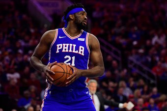 PHILADELPHIA, PA - MARCH 28: Joel Embiid #21 of the Philadelphia 76ers looks to pass during the first quarter at the Wells Fargo Center on March 28, 2019 in Philadelphia, Pennsylvania. The 76ers defeated the Nets 123-110. NOTE TO USER: User expressly ackn