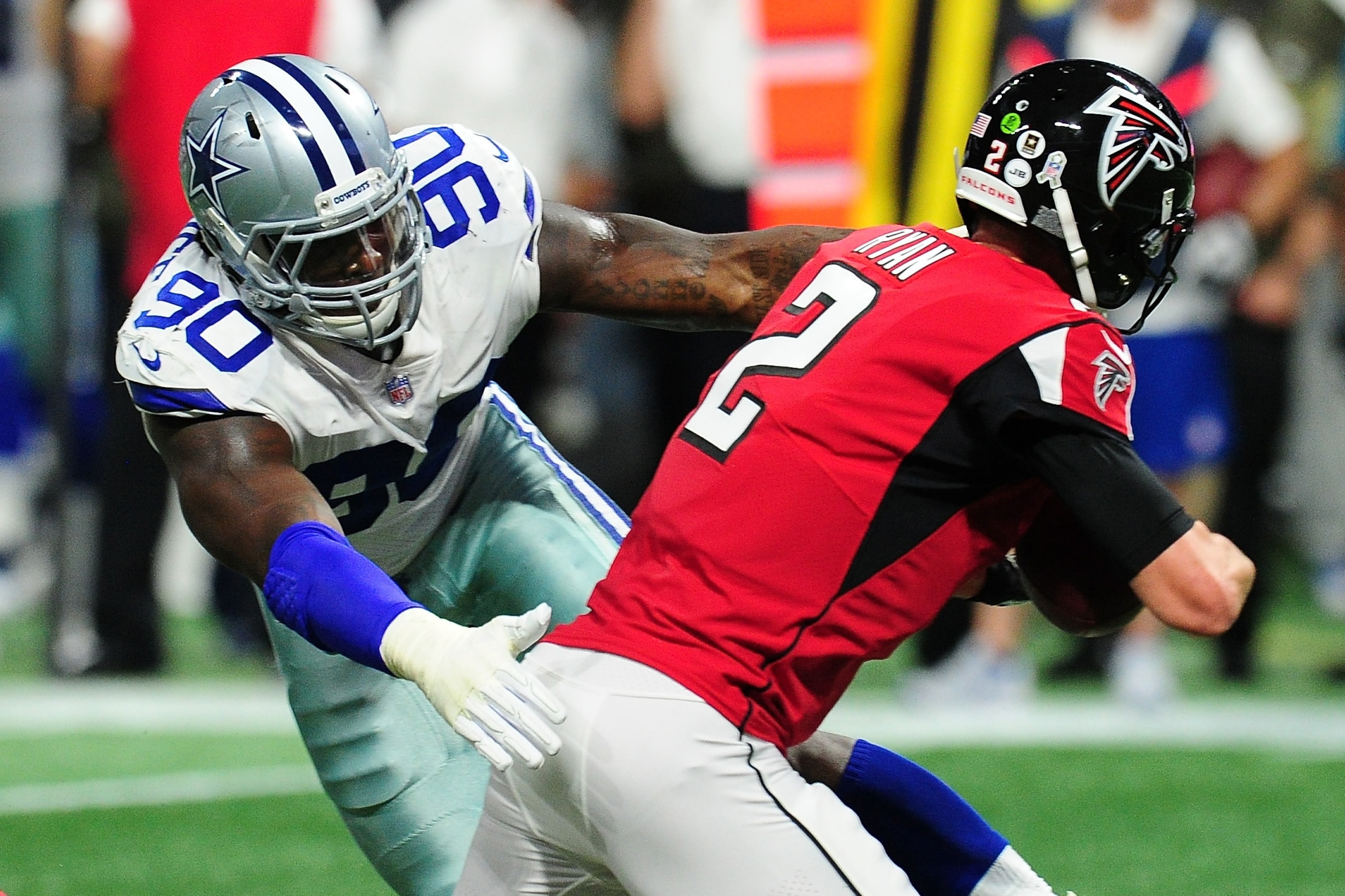 ATLANTA, GA - NOVEMBER 12: DeMarcus Lawrence #90 of the Dallas Cowboys sacks Matt Ryan #2 of the Atlanta Falcons during the first half at Mercedes-Benz Stadium on November 12, 2017 in Atlanta, Georgia. (Photo by Scott Cunningham/Getty Images) ATLANTA, GA - NOVEMBER 12: DeMarcus Lawrence #90 of the Dallas Cowboys sacks Matt Ryan #2 of the Atlanta Falcons during the first half at Mercedes-Benz Stadium on November 12, 2017 in Atlanta, Georgia. (Photo by Scott Cunningham/Getty Images)