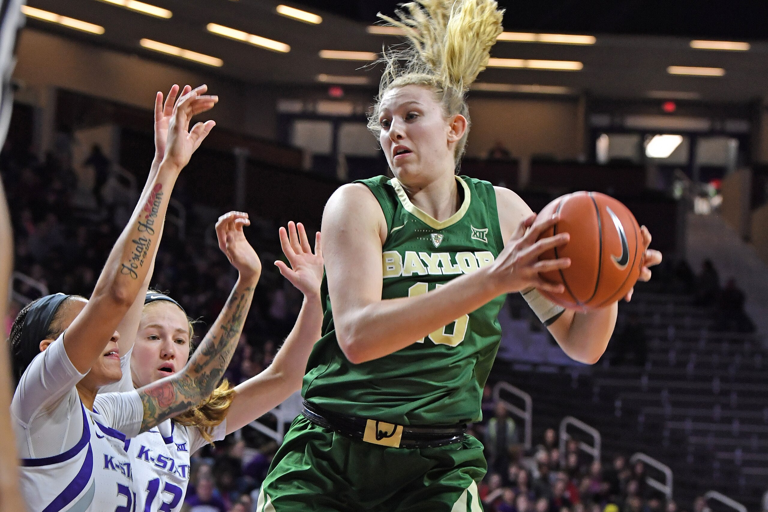 MANHATTAN, KS - FEBRUARY 13:  Lauren Cox #15 of the Baylor Bears grabs a rebound against the Kansas State Wildcats during the first half on February 13, 2019 at Bramlage Coliseum in Manhattan, Kansas.  (Photo by Peter G. Aiken/Getty Images)