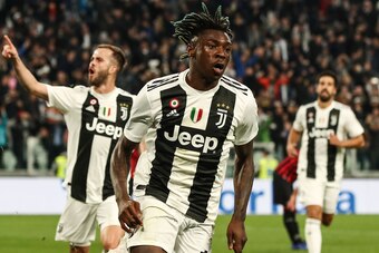 Juventus' Italian forward Moise Kean (C) celebrates after scoring during the Italian Serie A football match Juventus vs AC Milan on April 6, 2019 at the Juventus stadium in Turin. (Photo by Isabella BONOTTO / AFP)        (Photo credit should read ISABELLA