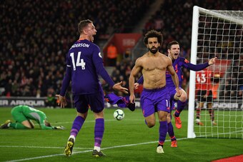SOUTHAMPTON, ENGLAND - APRIL 05: Mohamed Salah of Liverpool celebrates with Andrew Robertson and Jordan Henderson of Liverpool5 during the Premier League match between Southampton FC and Liverpool FC at St Mary's Stadium on April 05, 2019 in Southampton, 