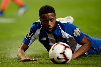 Porto's Portuguese forward Hernani Fortes lies on the ground during the Portuguese league football match between FC Porto and Boavista FC at the Dragao stadium in Porto on April 5, 2019. (Photo by MIGUEL RIOPA / AFP)        (Photo credit should read MIGUE