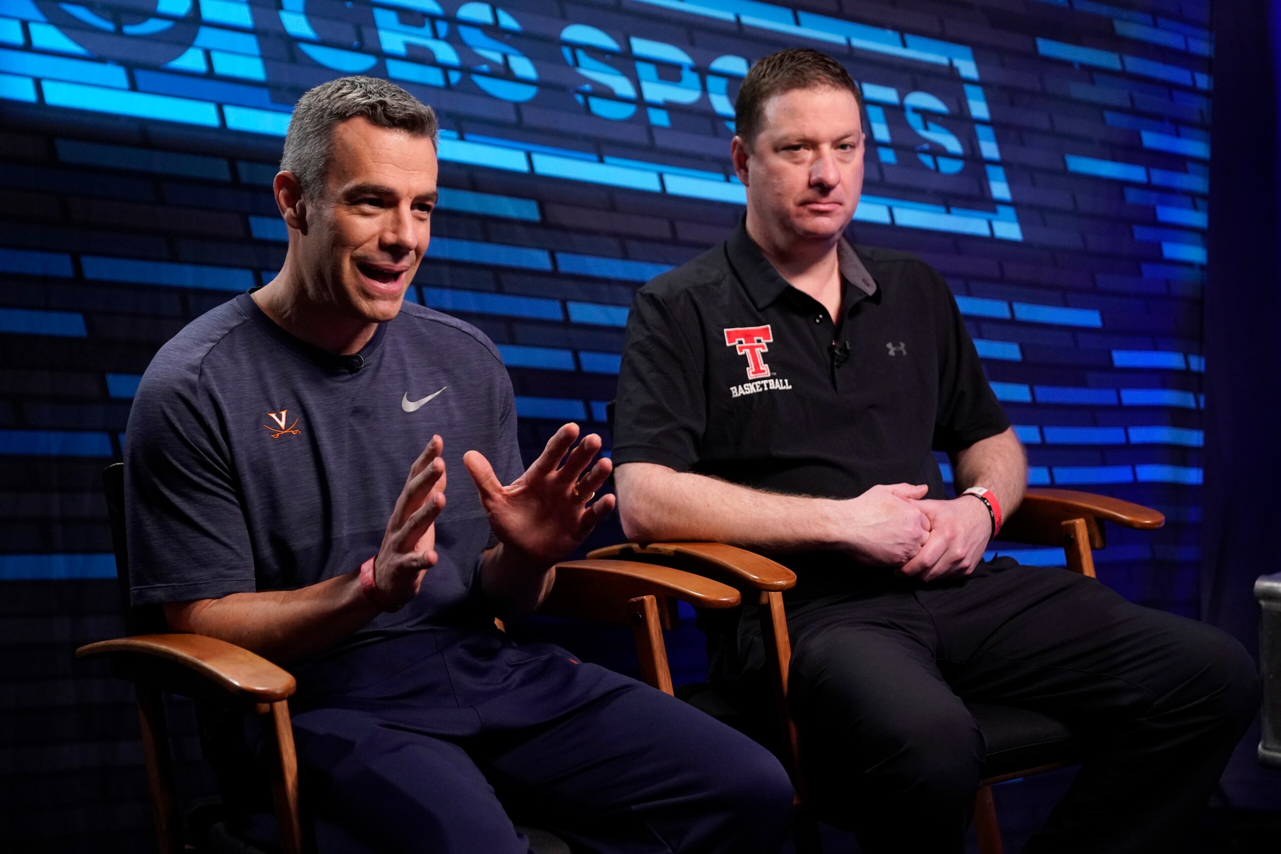 Tony Bennett (left) and Butch Beard answer questions prior to the title game.