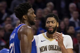 PHILADELPHIA, PA - NOVEMBER 21: Joel Embiid #21 of the Philadelphia 76ers talks to Anthony Davis #23 of the New Orleans Pelicans at the Wells Fargo Center on November 21, 2018 in Philadelphia, Pennsylvania. NOTE TO USER: User expressly acknowledges and ag