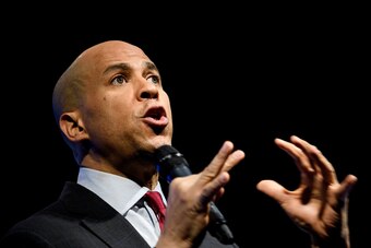 Senator Cory Booker (D-NJ), a 2020 US presidential hopeful, speaks during the 'We the People' gathering at the Warner Theatre on April 1, 2019, in Washington, DC. (Photo by Brendan Smialowski / AFP)        (Photo credit should read BRENDAN SMIALOWSKI/AFP/