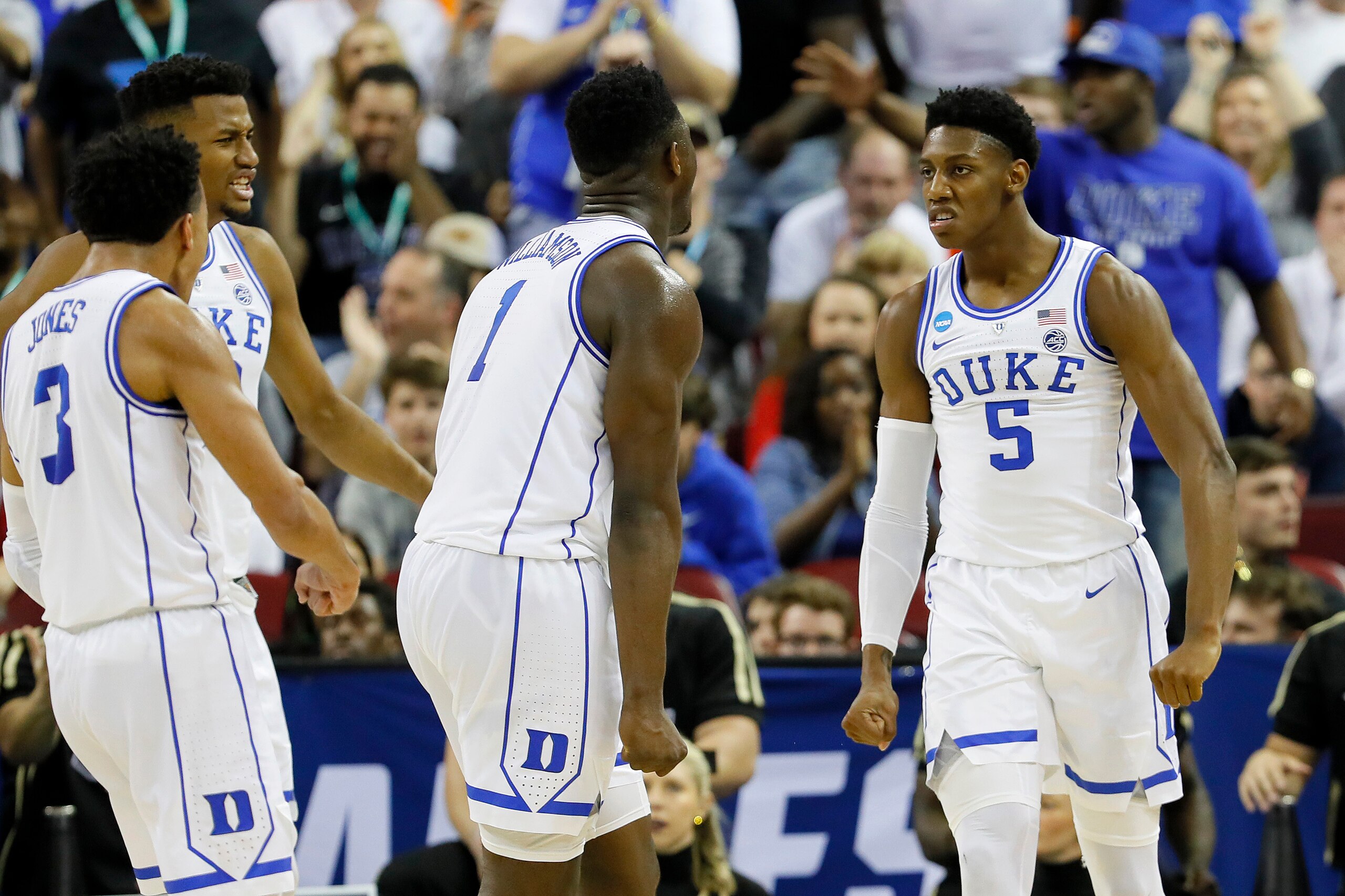 COLUMBIA, SOUTH CAROLINA - MARCH 24: Zion Williamson #1 of the Duke Blue Devils celebrates with RJ Barrett #5 and Tre Jones #3 against the UCF Knights during the first half in the second round game of the 2019 NCAA Men's Basketball Tournament at Colonial 