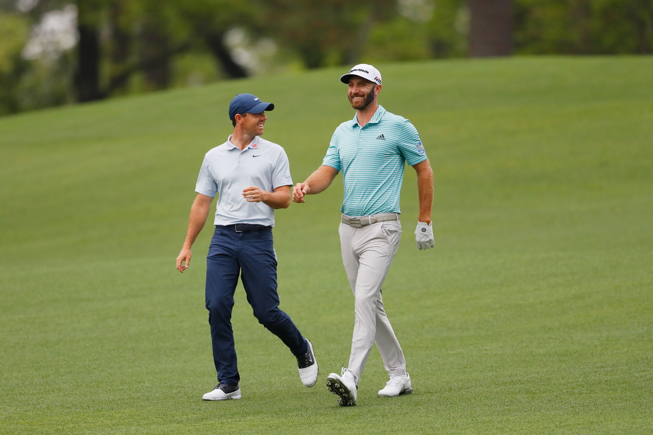 AUGUSTA, GEORGIA - APRIL 08:  Rory McIlroy of Northern Ireland and Dustin Johnson of the United States walk on the second hole during a practice round prior to The Masters at Augusta National Golf Club on April 08, 2019 in Augusta, Georgia. (Photo by Kevi