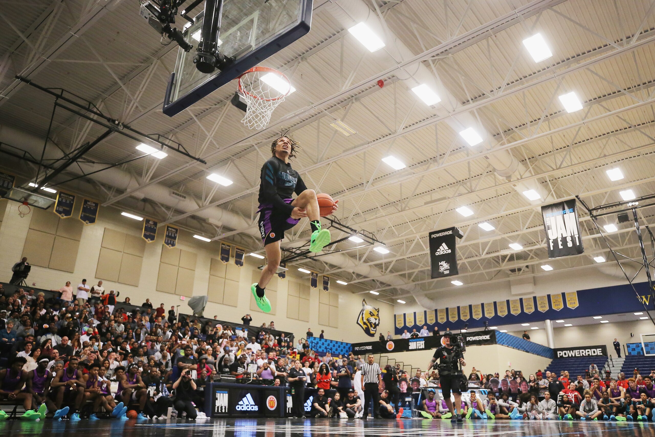 MARIETTA, GA - MARCH 25:  Cole Anthony competes in the dunk contest during the 2019 Powerade Jam Fest on March 25, 2019 in Marietta, Georgia.  (Photo by Mike Ehrmann/Getty Images for Powerade)