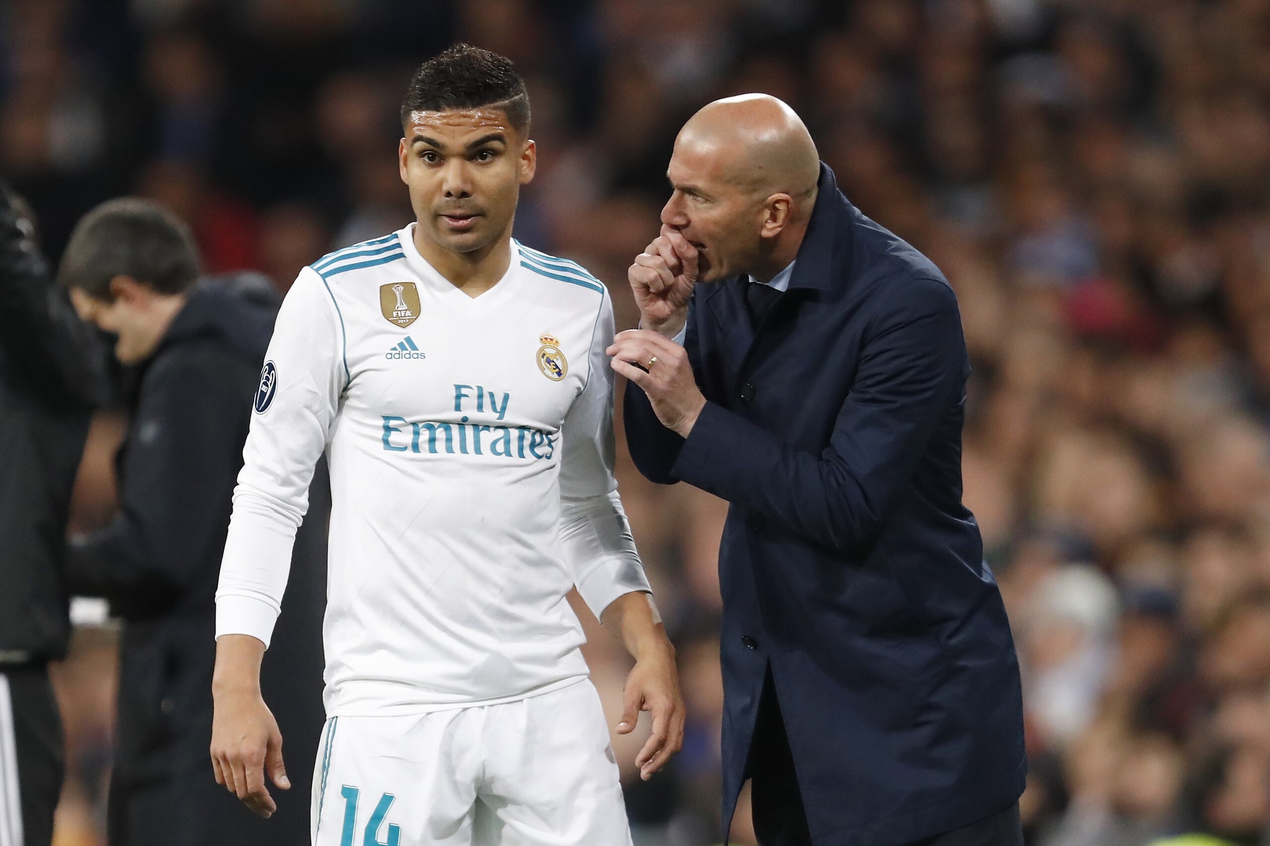 (L-R) Casemiro of Real Madrid, coach Zinedine Zidane of Real Madrid during the UEFA Champions League quarter final match between Real Madrid and Juventus FC at the Santiago Bernabeu stadium on April 11, 2018 in Madrid, Spain(Photo by VI Images via Getty I