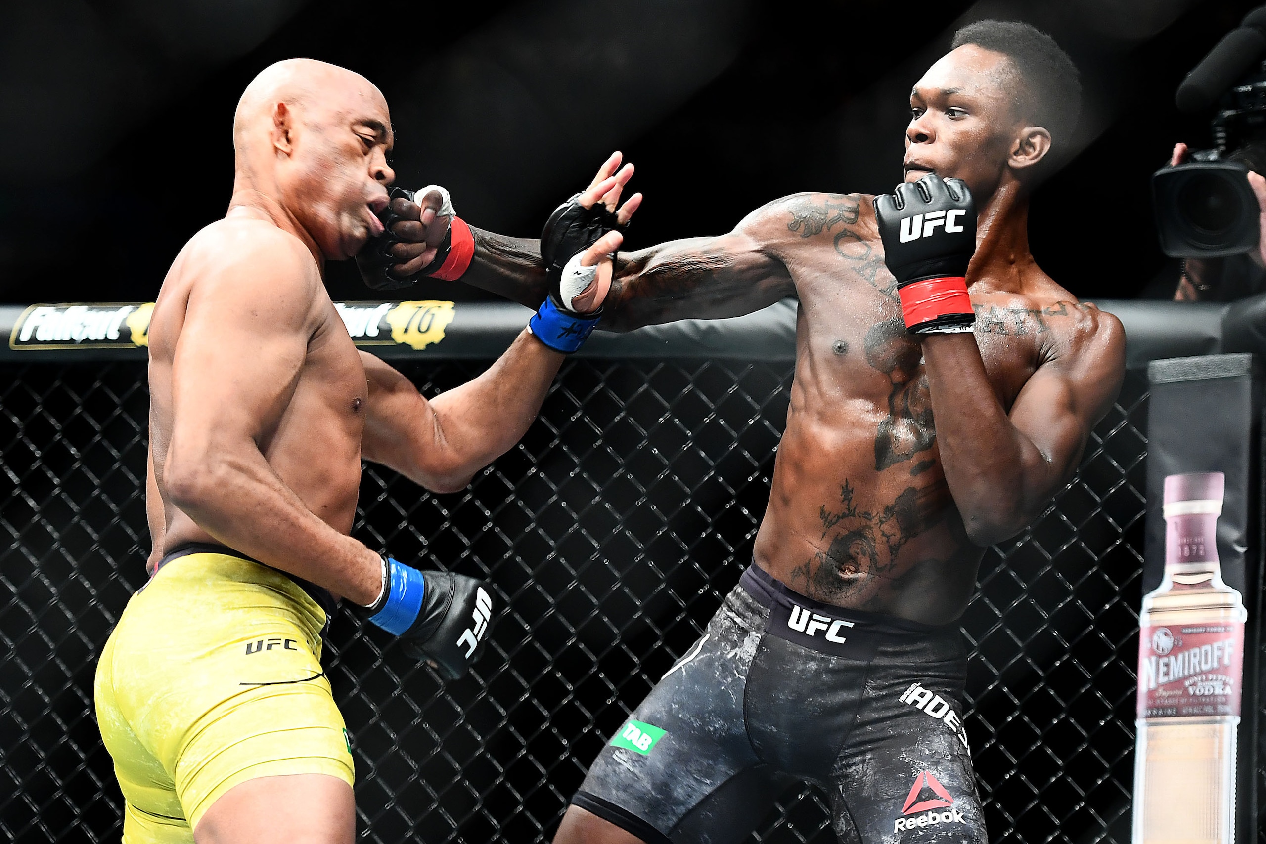MELBOURNE, AUSTRALIA - FEBRUARY 10:  Israel Adesanya of Nigeria punches Anderson Silva of Brazil during their Middleweight bout during UFC234 at Rod Laver Arena on February 10, 2019 in Melbourne, Australia.during UFC234 at Rod Laver Arena on February 10, 
