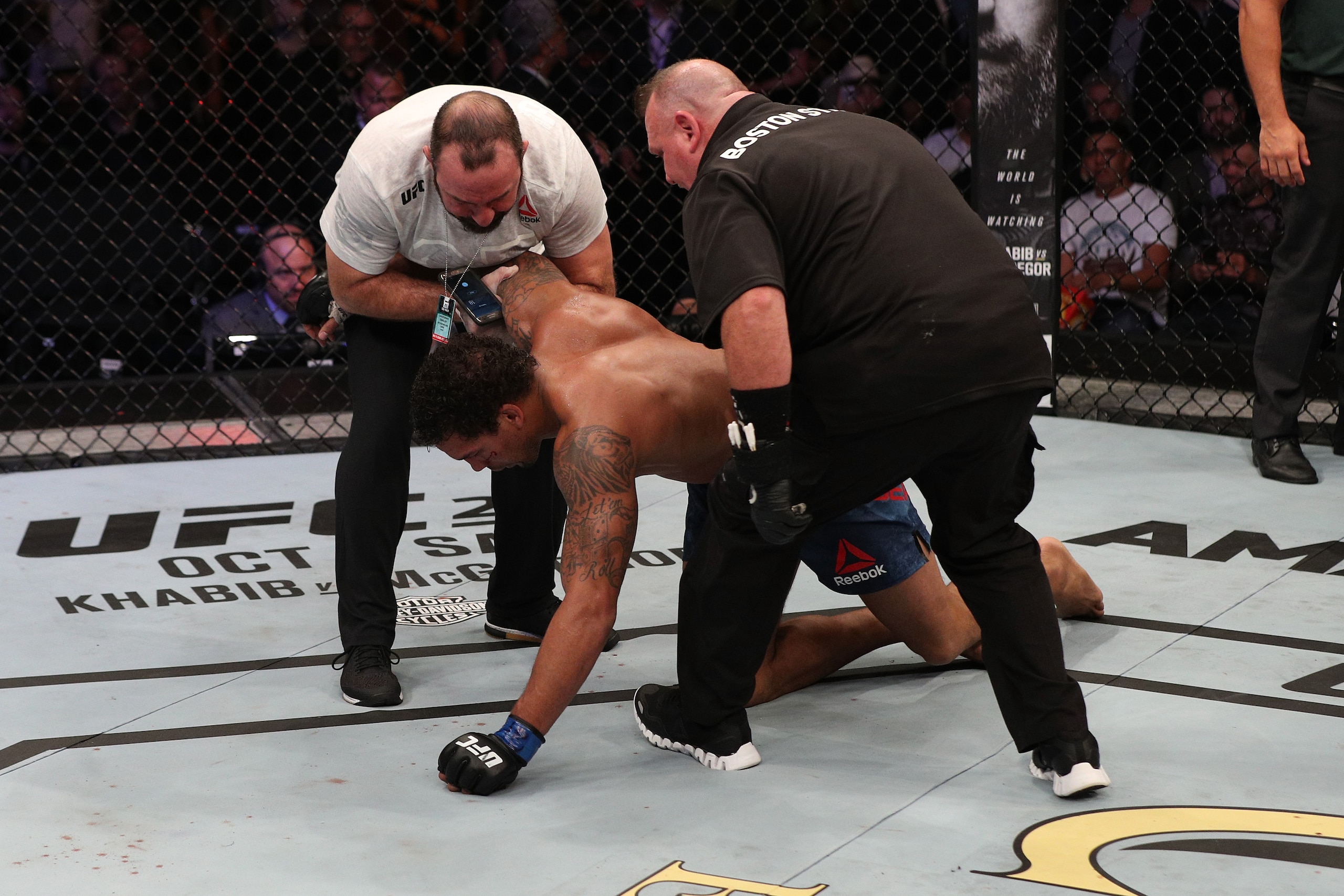 SAO PAULO, BRAZIL - SEPTEMBER 22:  Eryk Anders is helped to his corner after round three against Thiago Santos of Brazil in their middleweight bout during the UFC Fight Night event at Ibirapuera Gymnasium on September 22, 2018 in Sao Paulo, Brazil. (Photo
