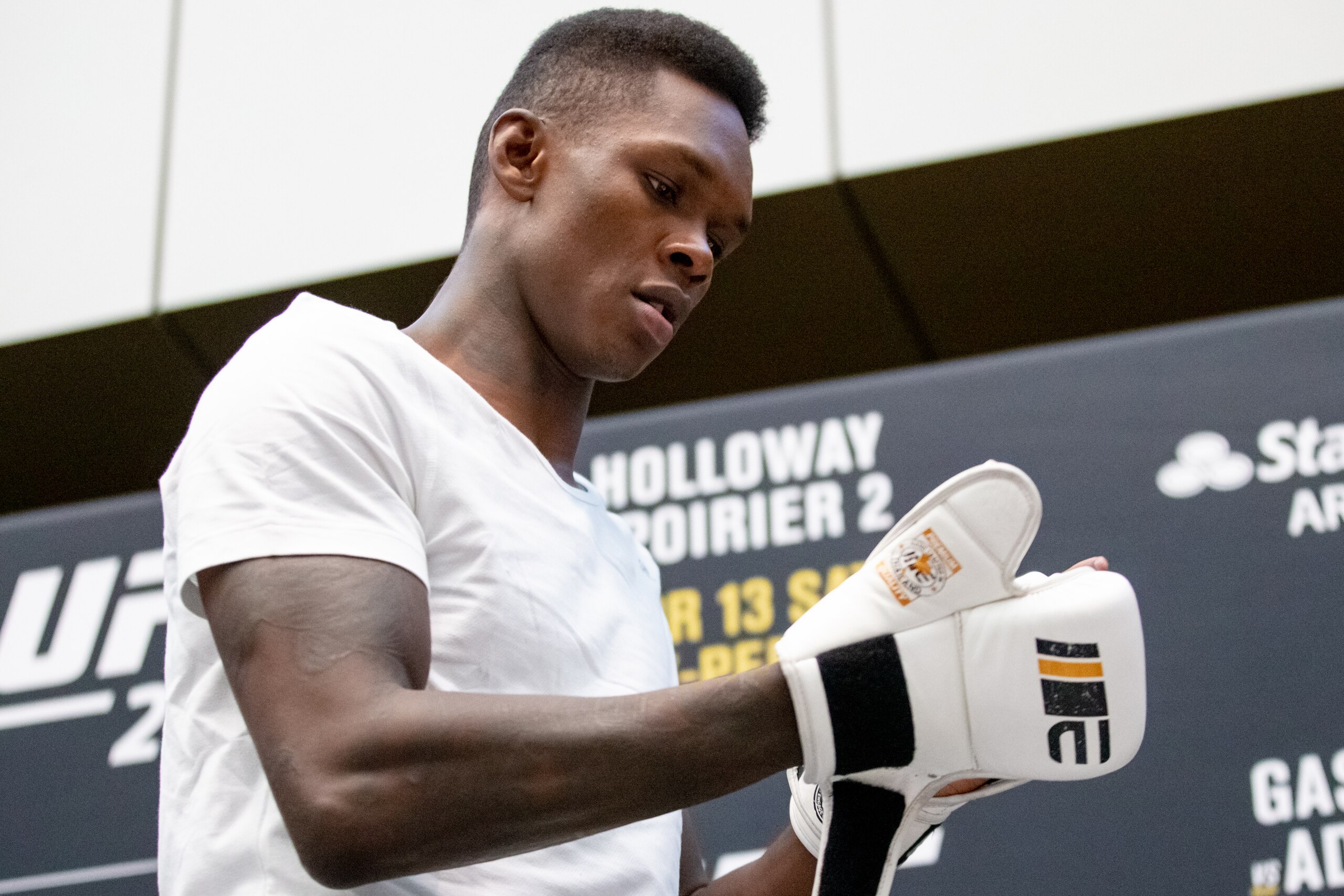 ATLANTA, GA - APRIL 10: UFC middleweight Israel Adesanya of Nigeria  works out for fans and media during the UFC 236 Open Workouts event at the College Football Hall of Fame on April 10, 2019 in Atlanta, Georgia. (Photo by Carmen Mandato/Zuffa LLC via Get