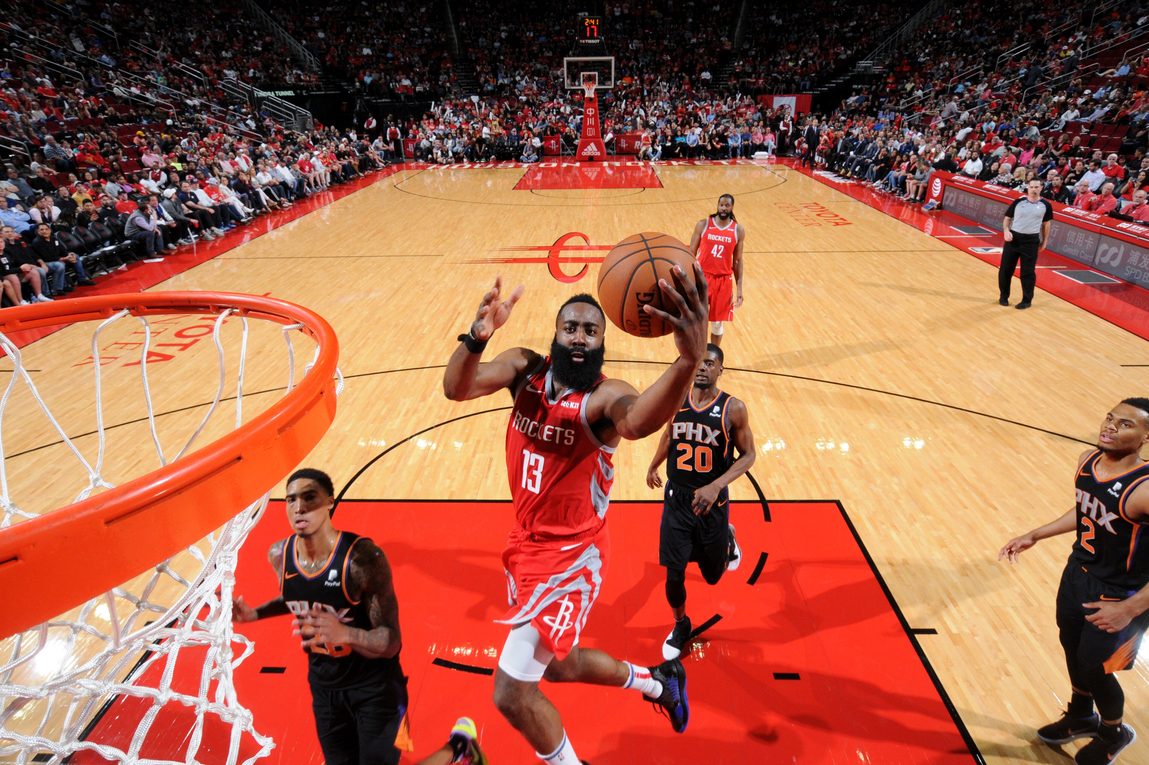 HOUSTON, TX - APRIL 7: James Harden #13 of the Houston Rockets goes to the basket against the Phoenix Suns on April 7, 2019 at the Toyota Center in Houston, Texas. NOTE TO USER: User expressly acknowledges and agrees that, by downloading and/or using this HOUSTON, TX - APRIL 7: James Harden #13 of the Houston Rockets goes to the basket against the Phoenix Suns on April 7, 2019 at the Toyota Center in Houston, Texas. NOTE TO USER: User expressly acknowledges and agrees that, by downloading and/or using this