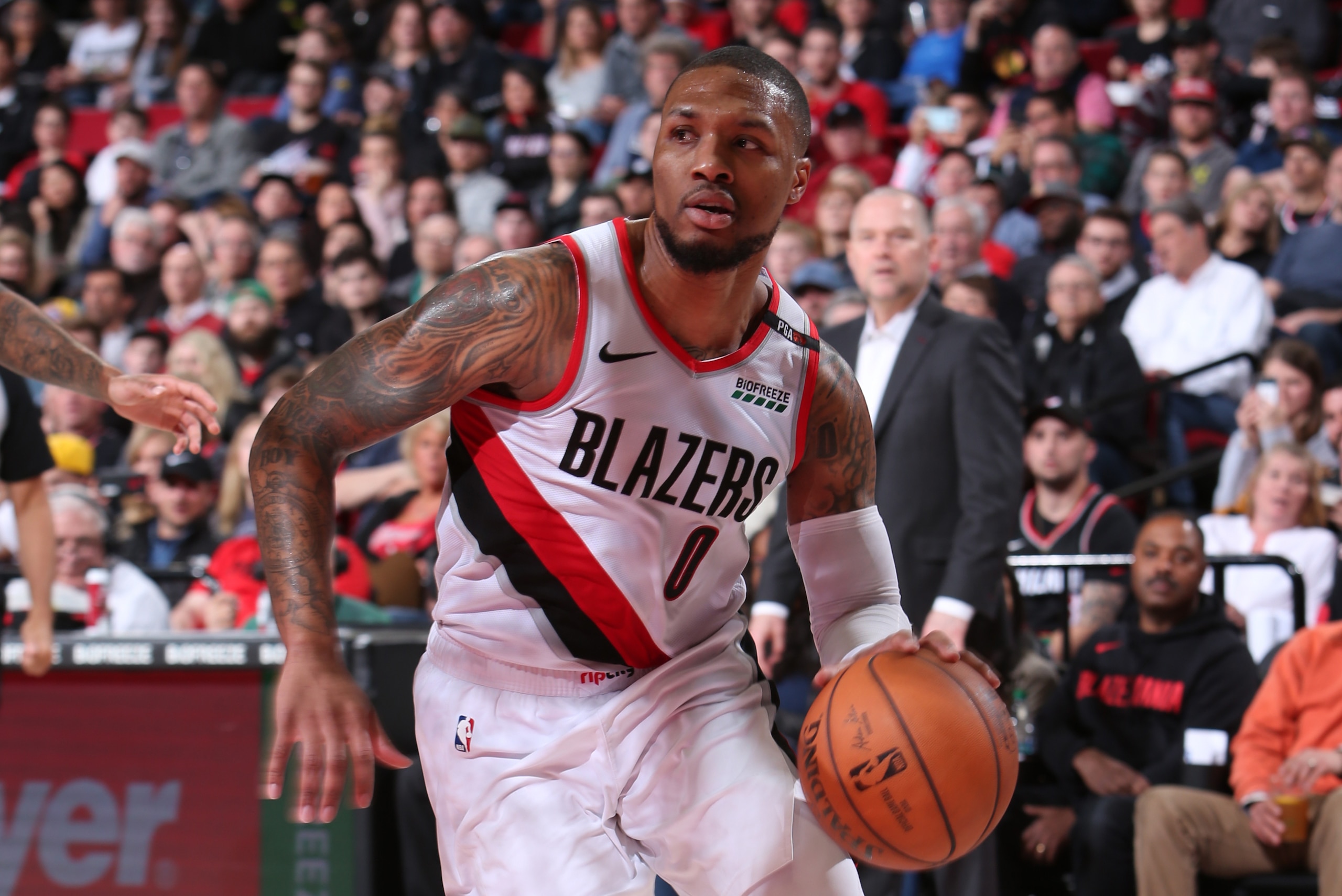 PORTLAND, OR - APRIL 7: Damian Lillard #0 of the Portland Trail Blazers handles the ball against the Denver Nuggets on April 7, 2019 at the Moda Center in Portland, Oregon. NOTE TO USER: User expressly acknowledges and agrees that, by downloading and/or u