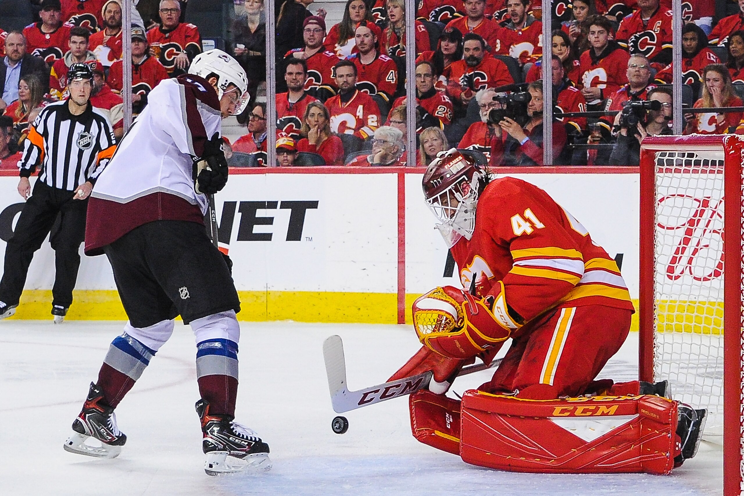 CALGARY, AB - APRIL 11: Tyson Jost #17 of the Colorado Avalanche takes a shot on Mike Smith #41 of the Calgary Flames in Game One of the Western Conference First Round during the 2019 NHL Stanley Cup Playoffs at Scotiabank Saddledome on March 15, 2019 in 