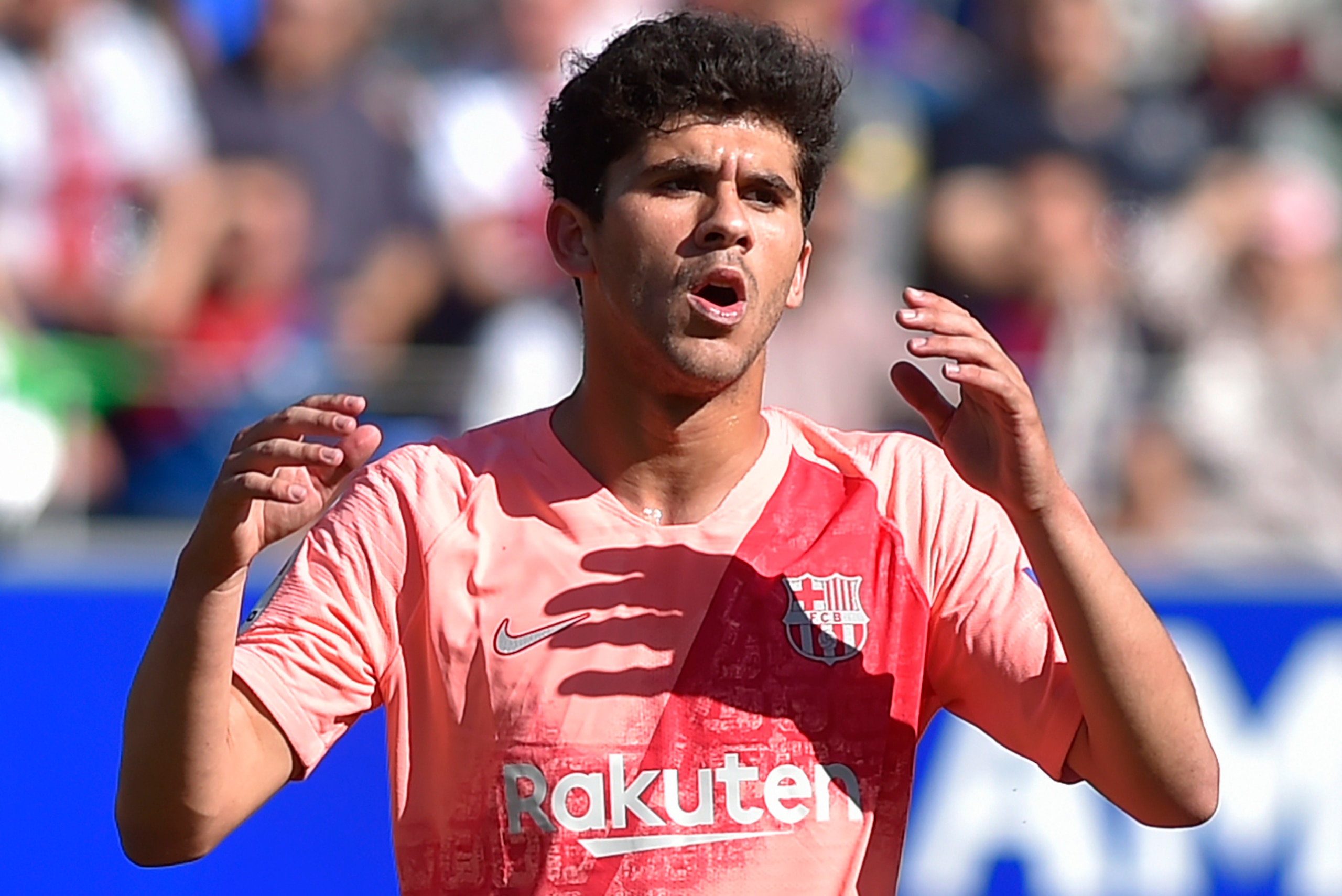 Barcelona's Spanish midfielder Carles Alena gestures during the Spanish league football match between SD Huesca and FC Barcelona at the El Alcoraz stadium in Huesca on April 13, 2019. (Photo by ANDER GILLENEA / AFP)        (Photo credit should read ANDER 