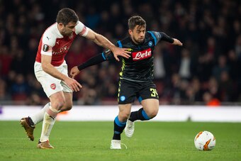 LONDON, ENGLAND - APRIL 11:  Sokratis Papastathopoulos of Arsenal and Amin Younes of Napoli during the UEFA Europa League Quarter Final First Leg match between Arsenal and S.S.C. Napoli at Emirates Stadium on April 11, 2019 in London, England. (Photo by V