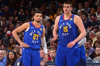 DENVER, CO - APRIL 5: Jamal Murray #27 and Nikola Jokic #15 of the Denver Nuggets as seen during the game against the Portland Trail Blazers on April 5, 2019 at the Pepsi Center in Denver, Colorado. NOTE TO USER: User expressly acknowledges and agrees tha