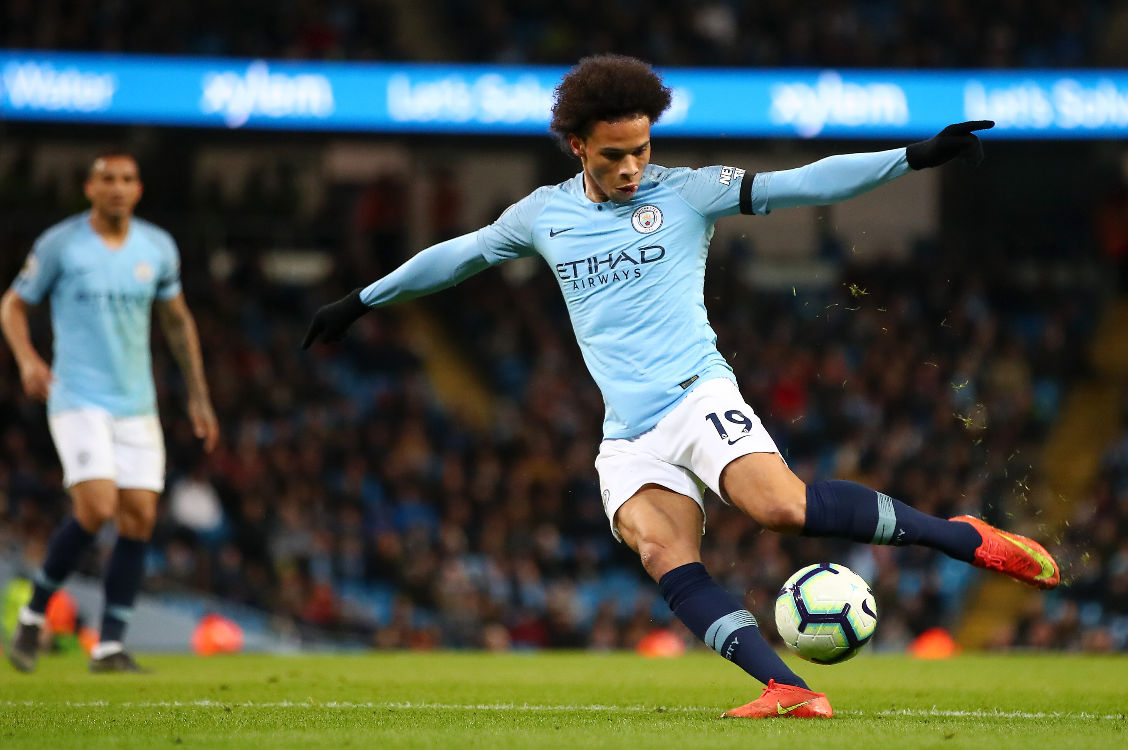 MANCHESTER, ENGLAND - APRIL 03: Leroy Sane of Manchester City scores his team's second goal during the Premier League match between Manchester City and Cardiff City at Etihad Stadium on April 03, 2019 in Manchester, United Kingdom. (Photo by Clive Brunski